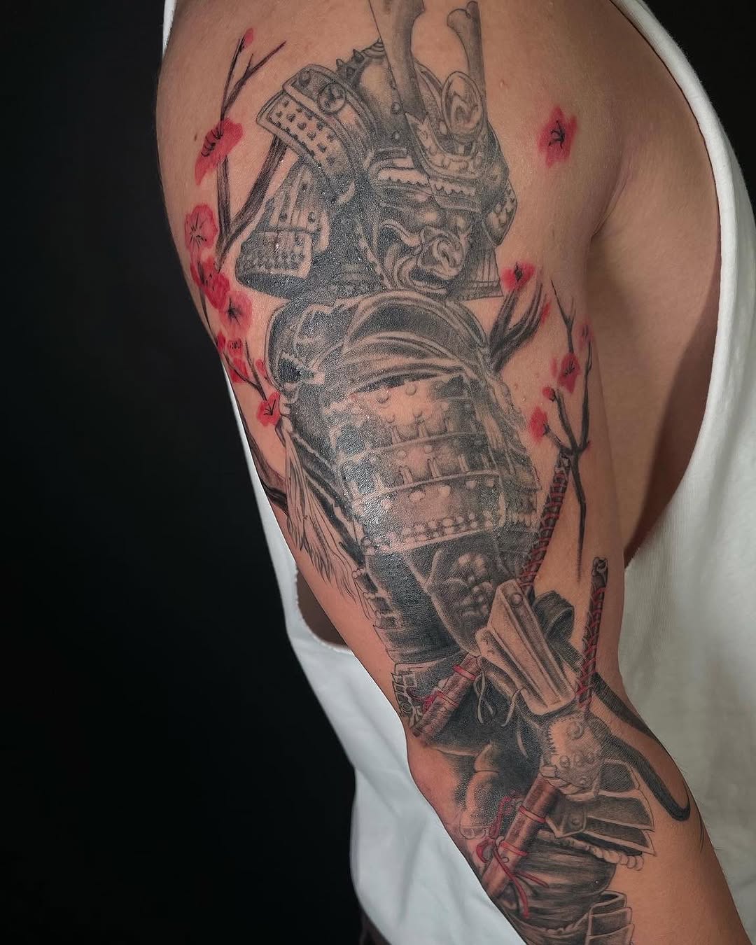 Samurai armor with cherry blossoms Japanese tattoo on the upper arm by Antonio