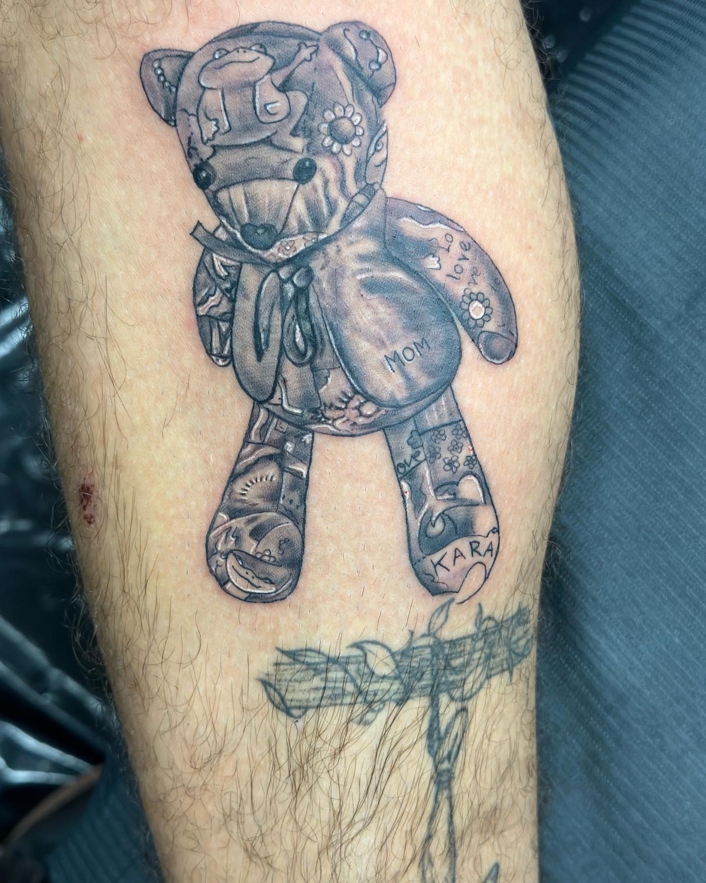 Teddy bear black and grey tattoo on the forearm by Cyko Hernandez