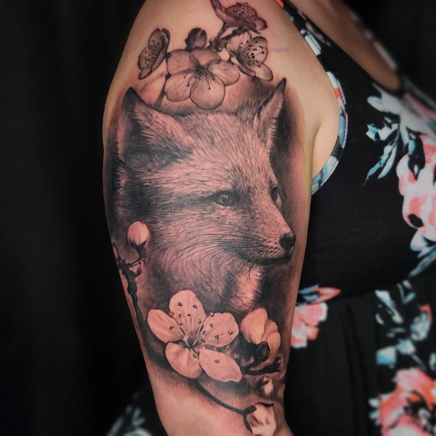 Fox and cherry blossoms realism tattoo on the forearm by Don Taylor