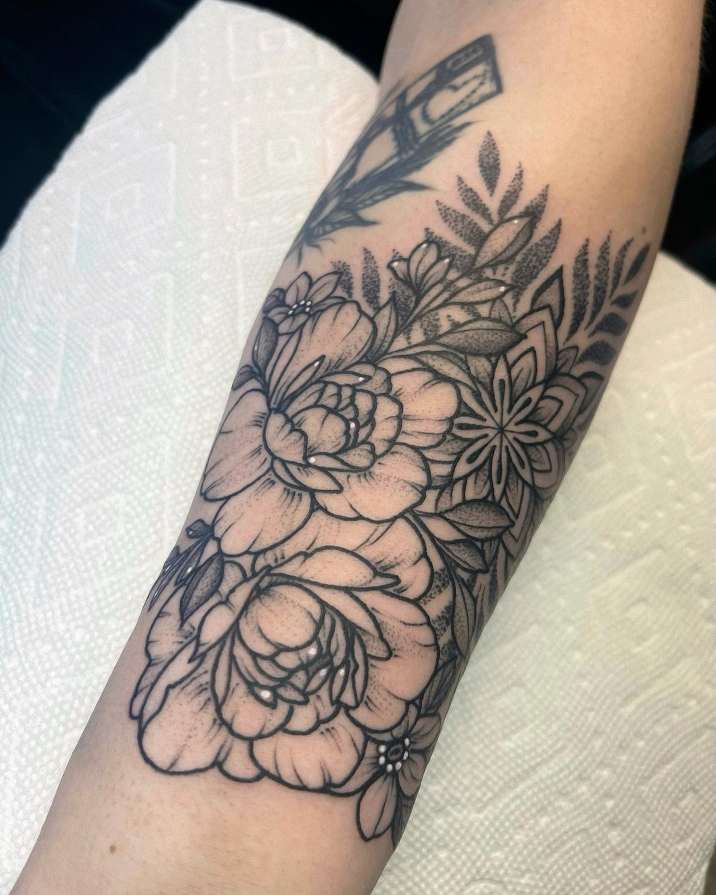 Floral bouquet black and grey tattoo on the forearm by 𝐀𝐘𝐀𝐍𝐀𝐇