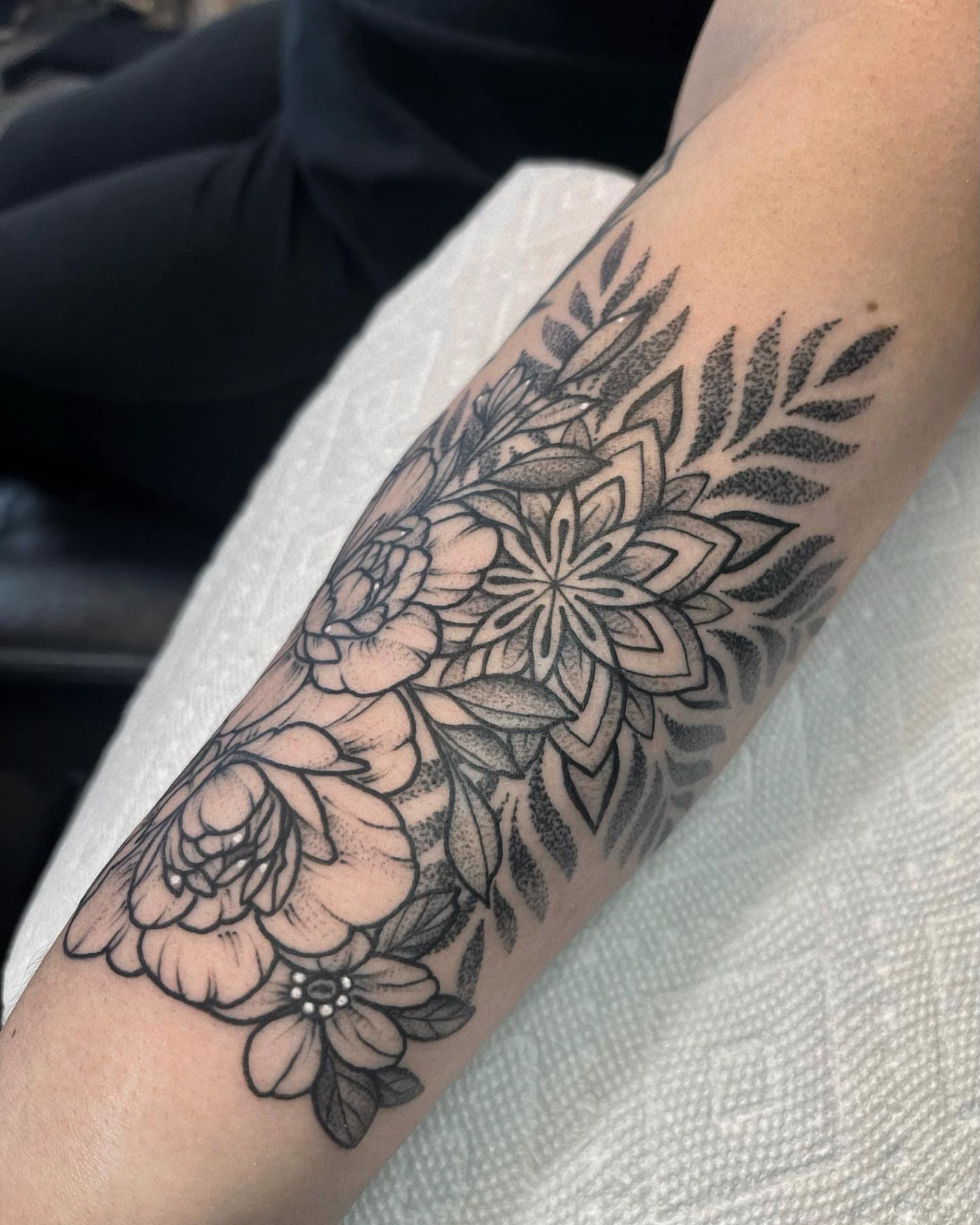 Floral arrangement black and grey tattoo on the forearm by 𝐀𝐘𝐀𝐍𝐀𝐇