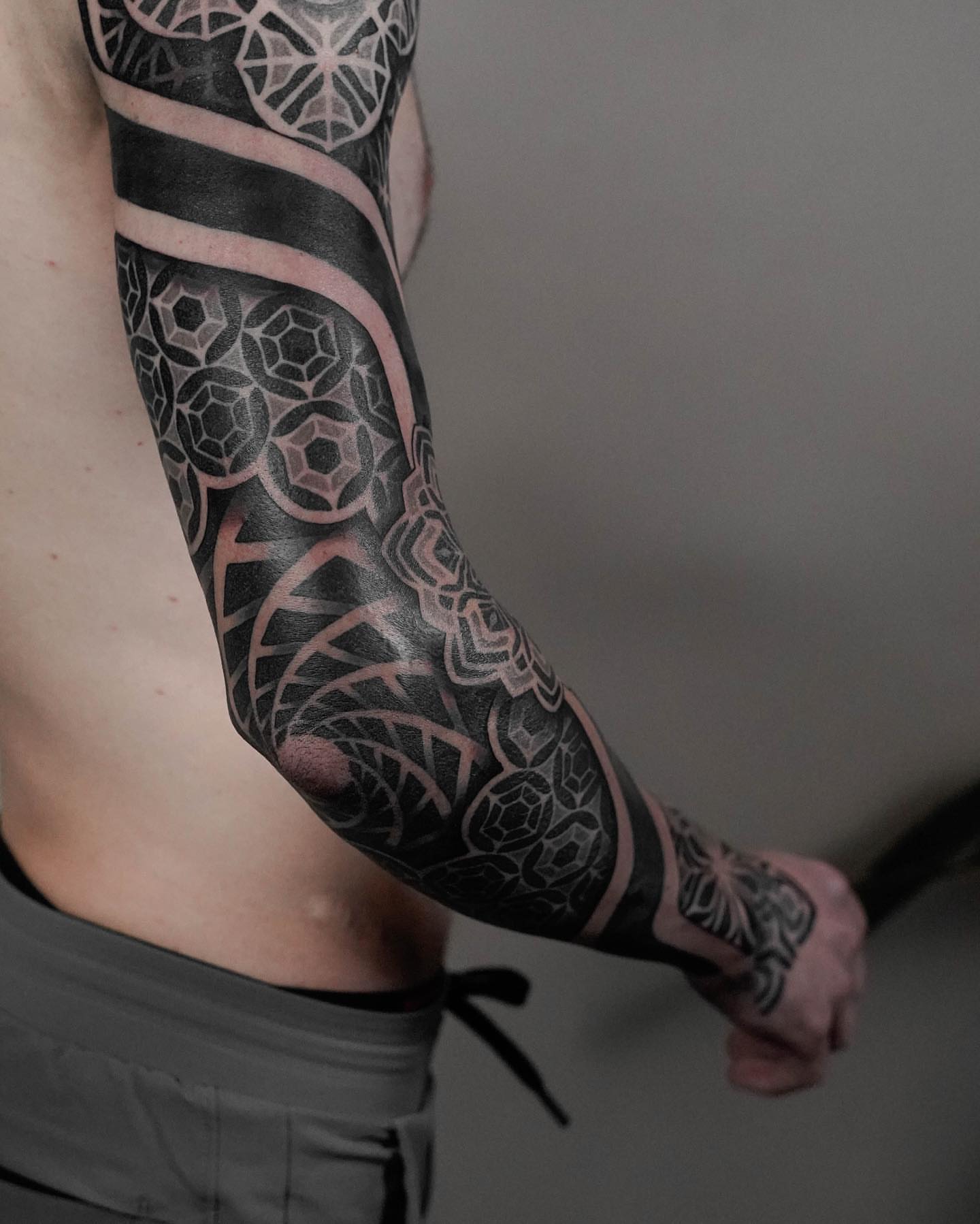 Geometric patterns geometric tattoo on the forearm by Ross Krandel