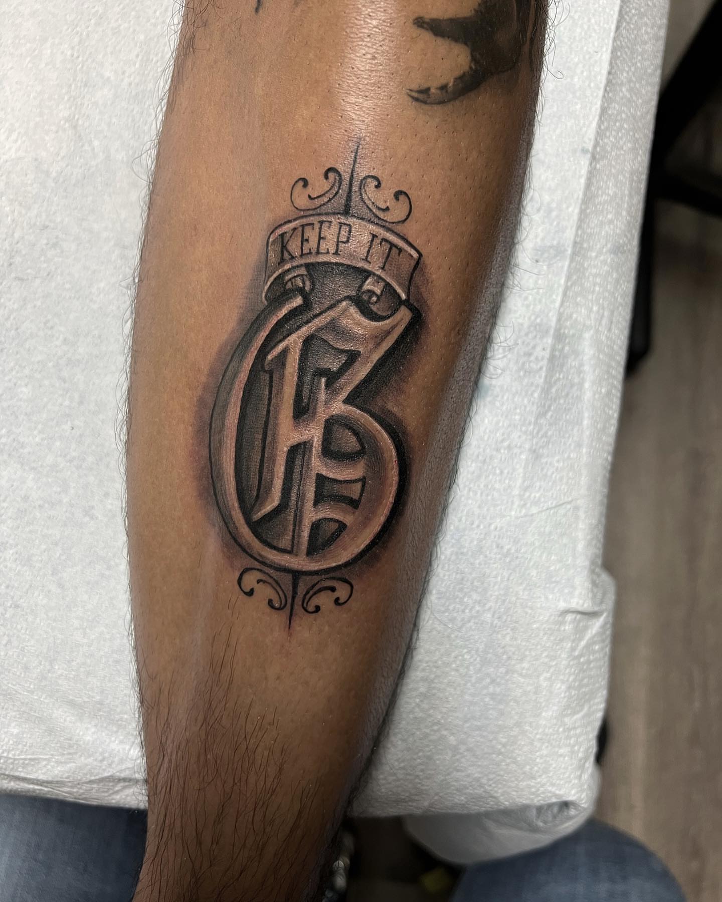 Keep it black and grey tattoo on the forearm by Nance⚡