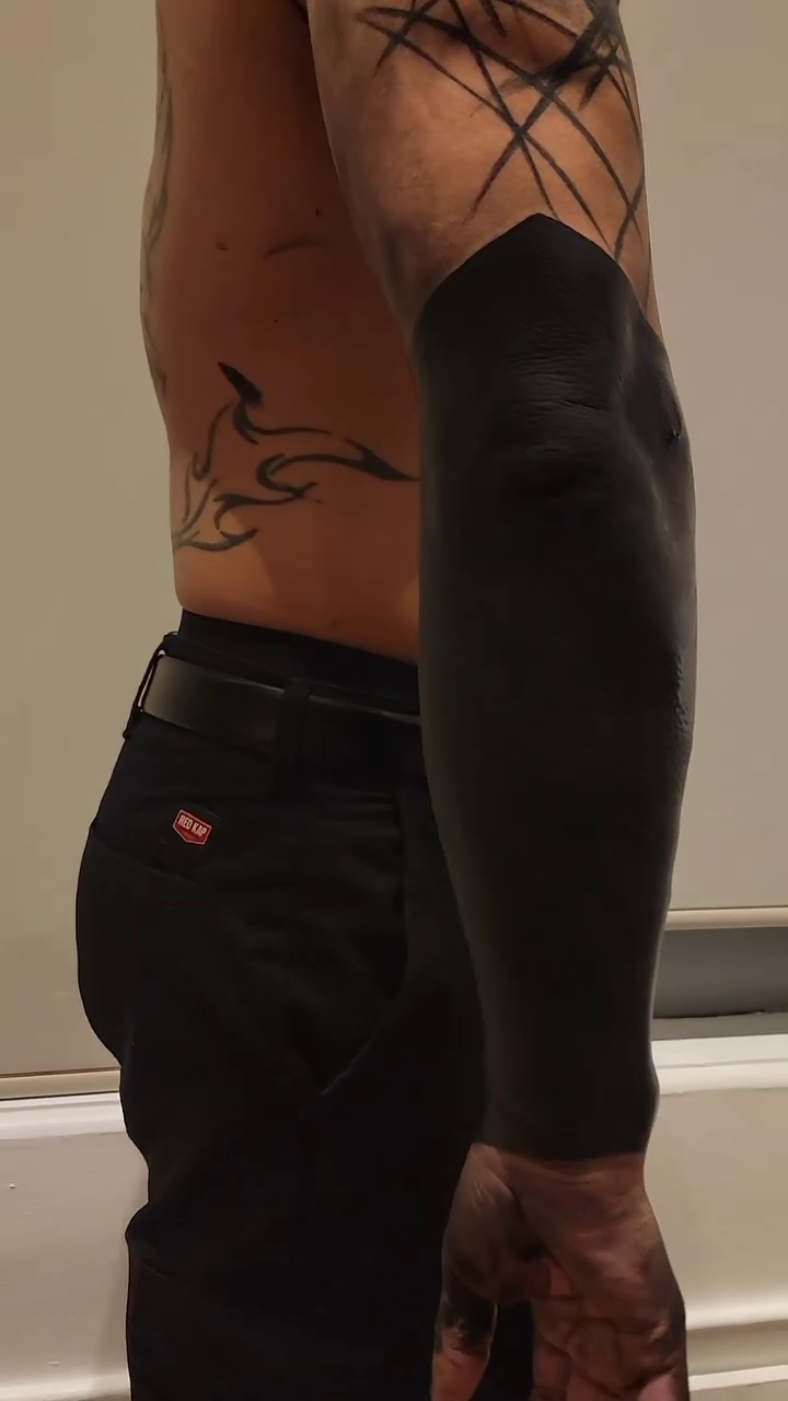 Full sleeve blackwork tattoo by Kevin Ligabue