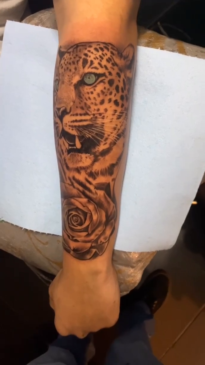 Leopard and rose tattoo realism tattoo by Breyner, Cambridge, Massachusetts