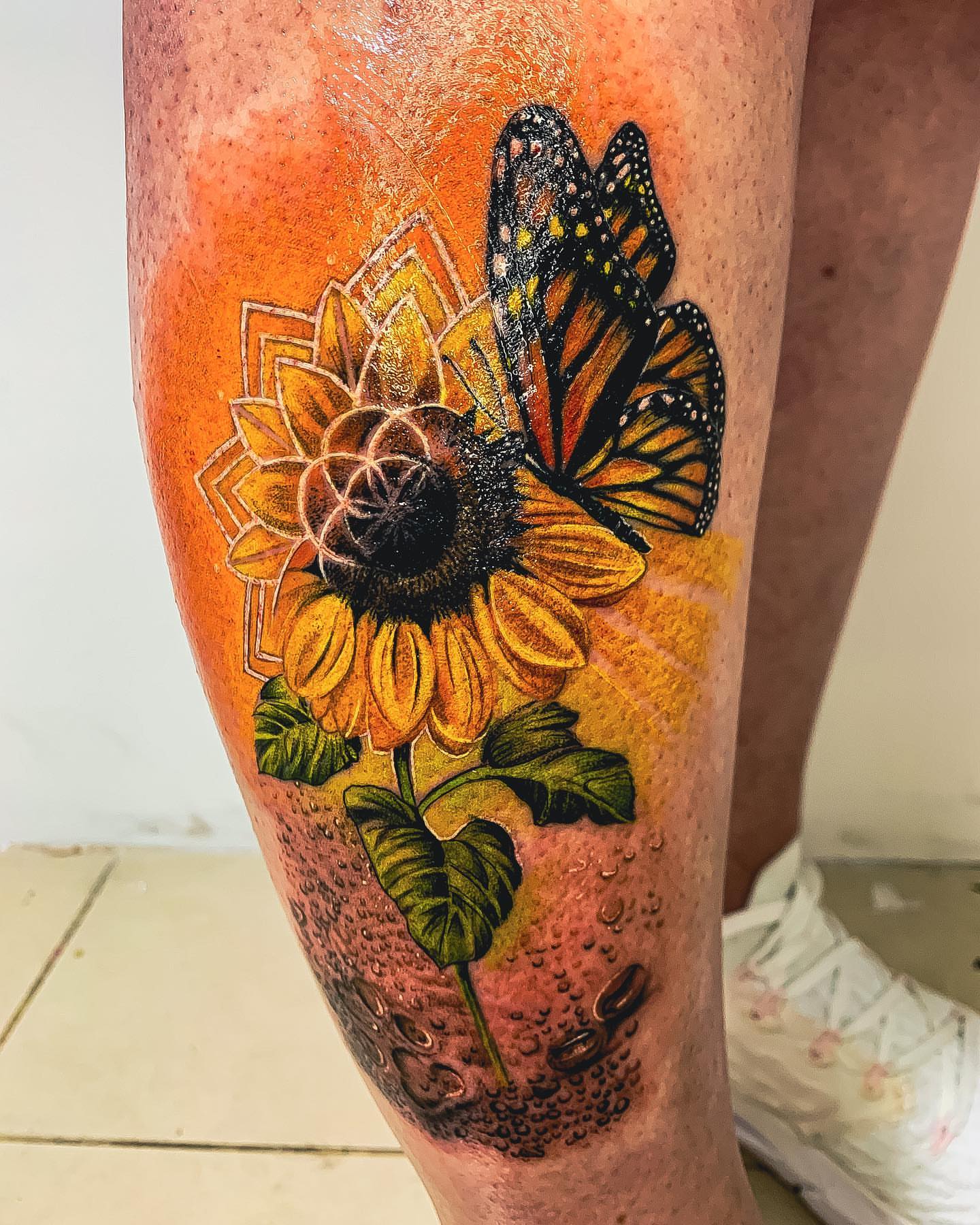 Sunflower and butterfly dotwork tattoo on the calf by 𝔄𝔩𝔳𝔞𝔯𝔬 𝔓𝔦𝔫𝔦𝔩𝔩𝔞