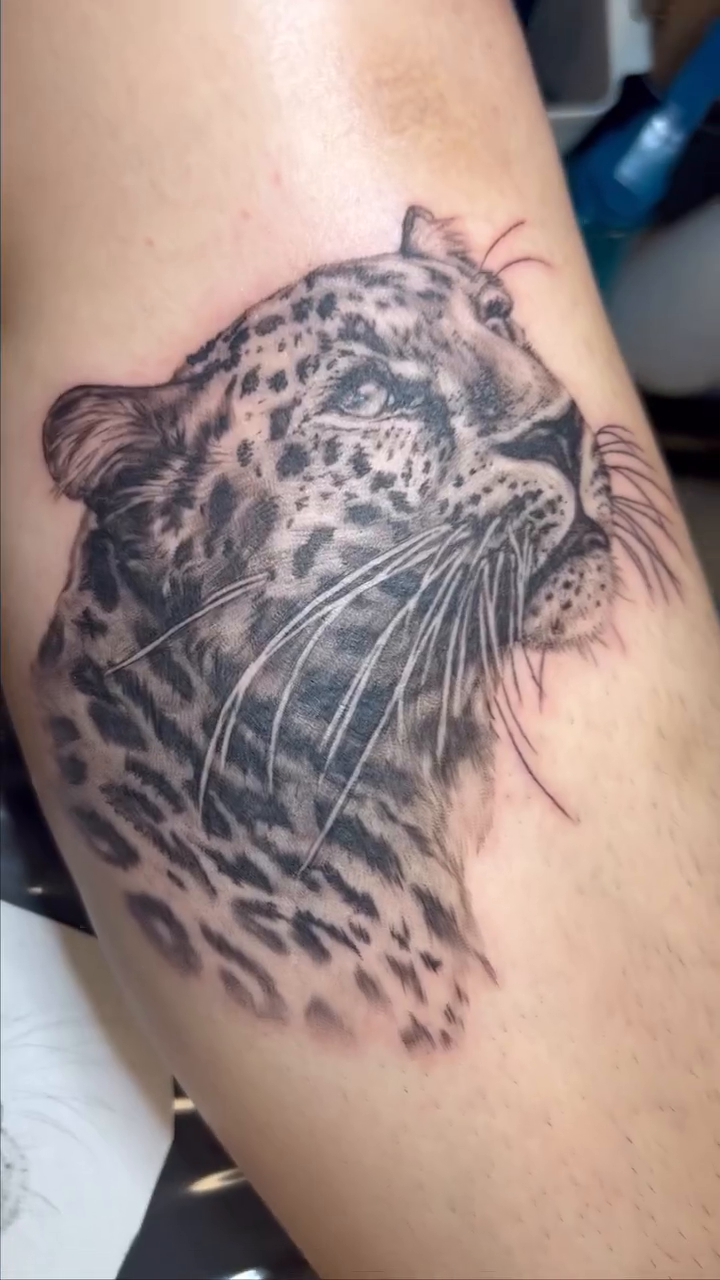 Tattoo by @tatman_cris โ realism, black_and_grey