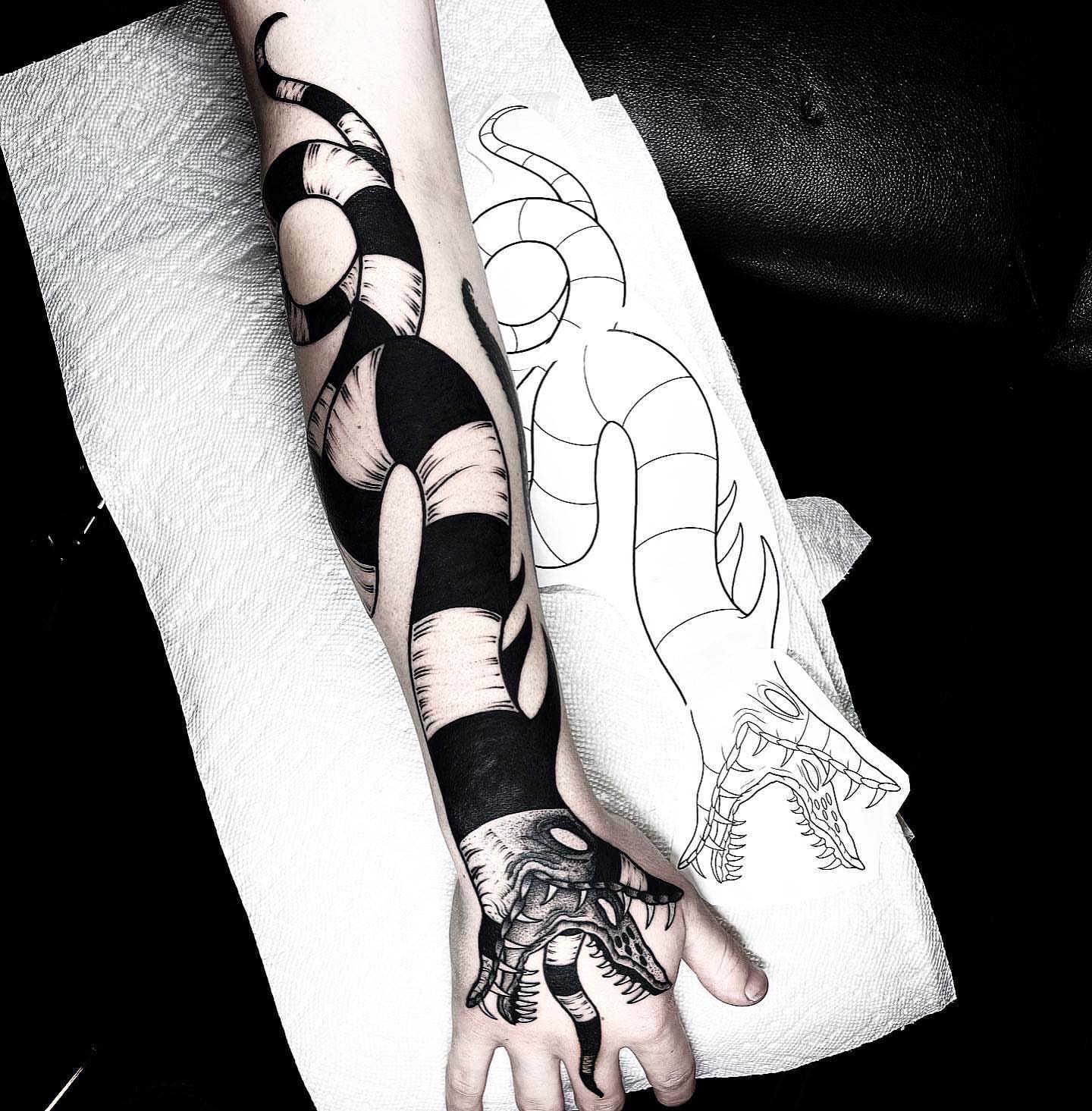 Snake black and grey tattoo on the forearm by Jared🗡Hughes