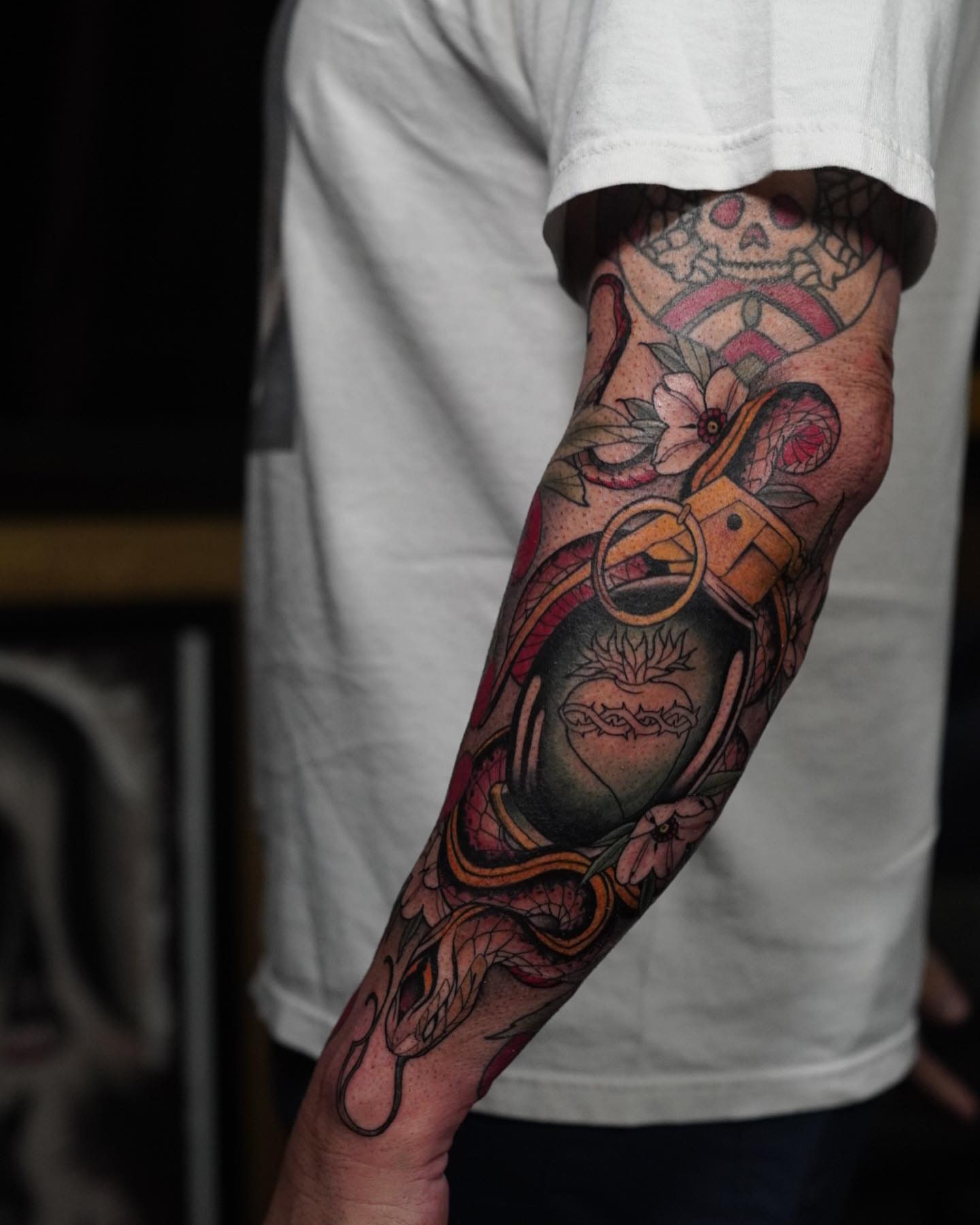 Snake and dagger American traditional tattoo on the forearm by Neo-Traditional tattoos in Las Vegas