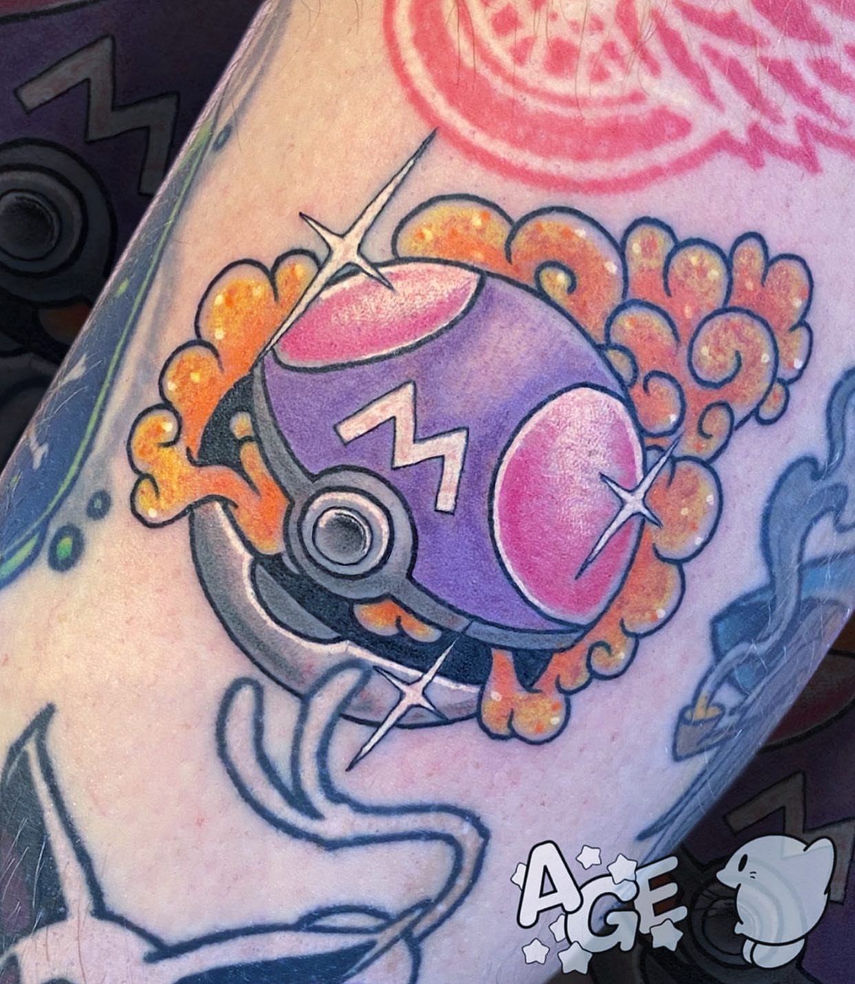 Pokémon Poké Ball new school tattoo on the forearm by Otaku and Gamer Tattooer
