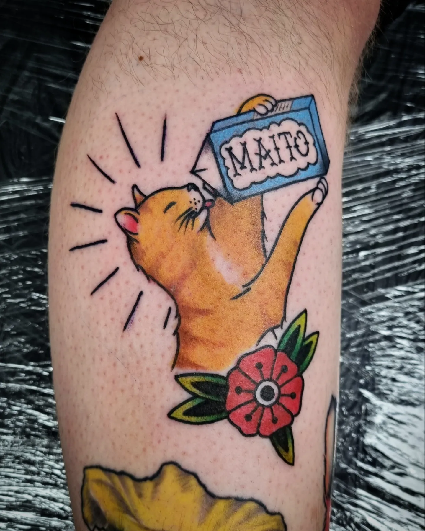 Cat drinking milk American traditional tattoo on the forearm by AntiheroTattoo