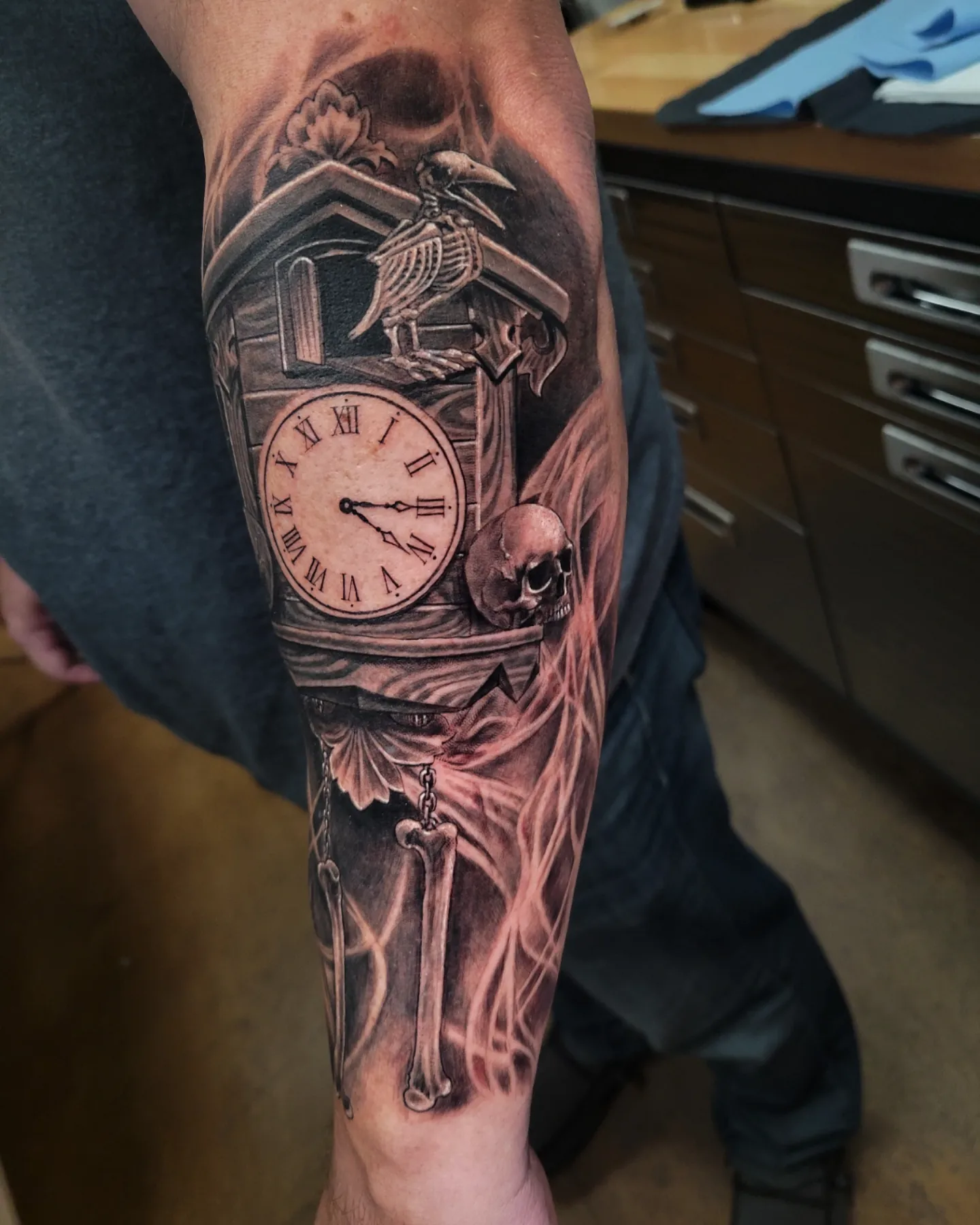 Clock and skull realism tattoo on the forearm by Brandon Rabago, Fort Worth, Texas