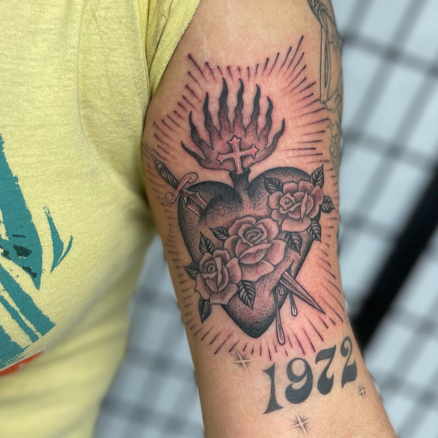 Heart with roses American traditional tattoo on the forearm by Mister Joe Joe Frisco Tattoo, San Francisco, California