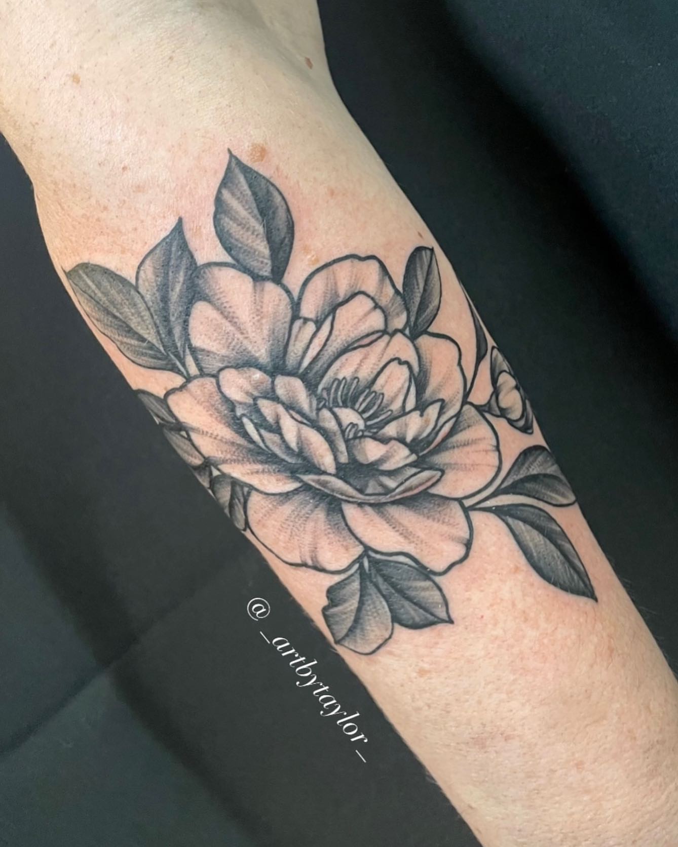 Peony black and grey tattoo on the forearm by Taylor✍🏽️
