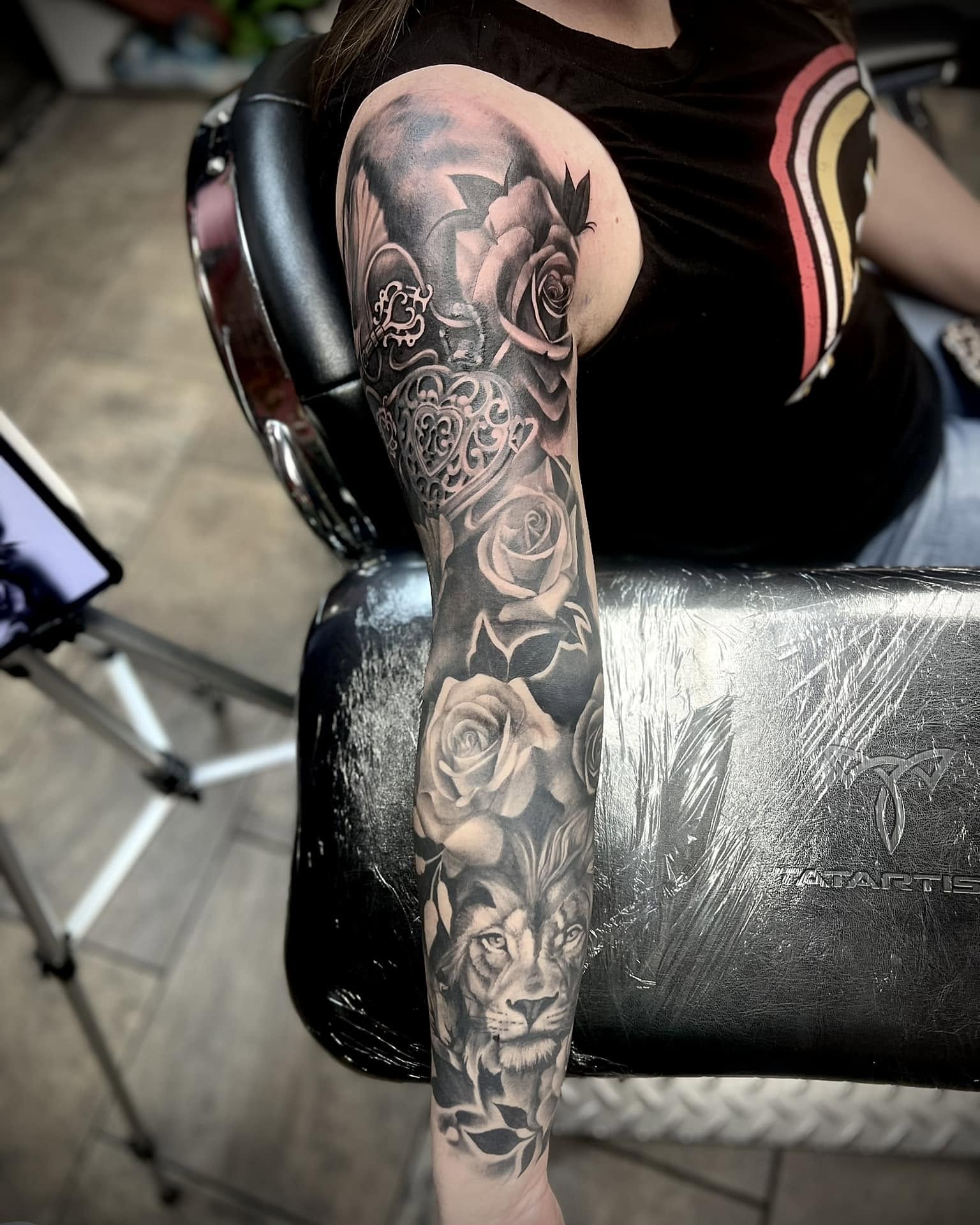 Tattoo by @leftycolbert_official — black_and_grey, realism