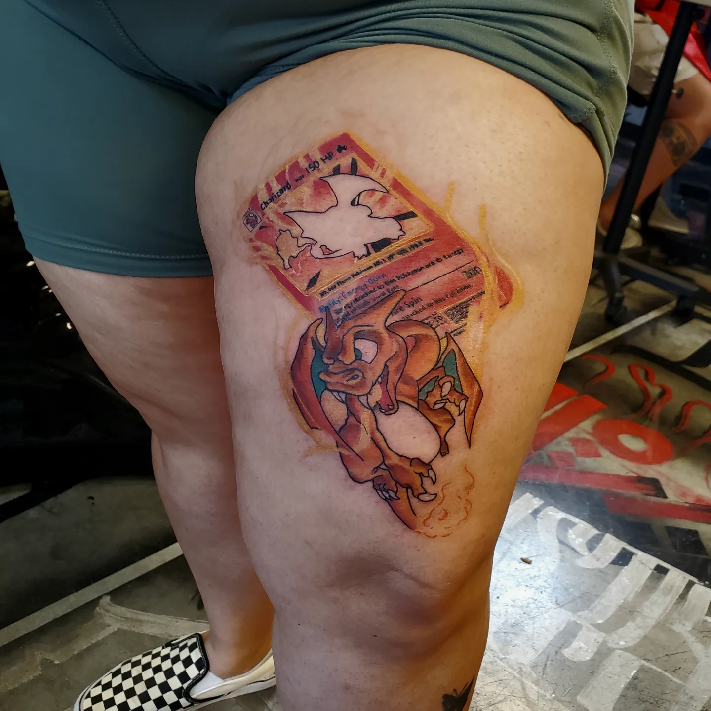 Dragon new school tattoo on the thigh by Chris TL Jones