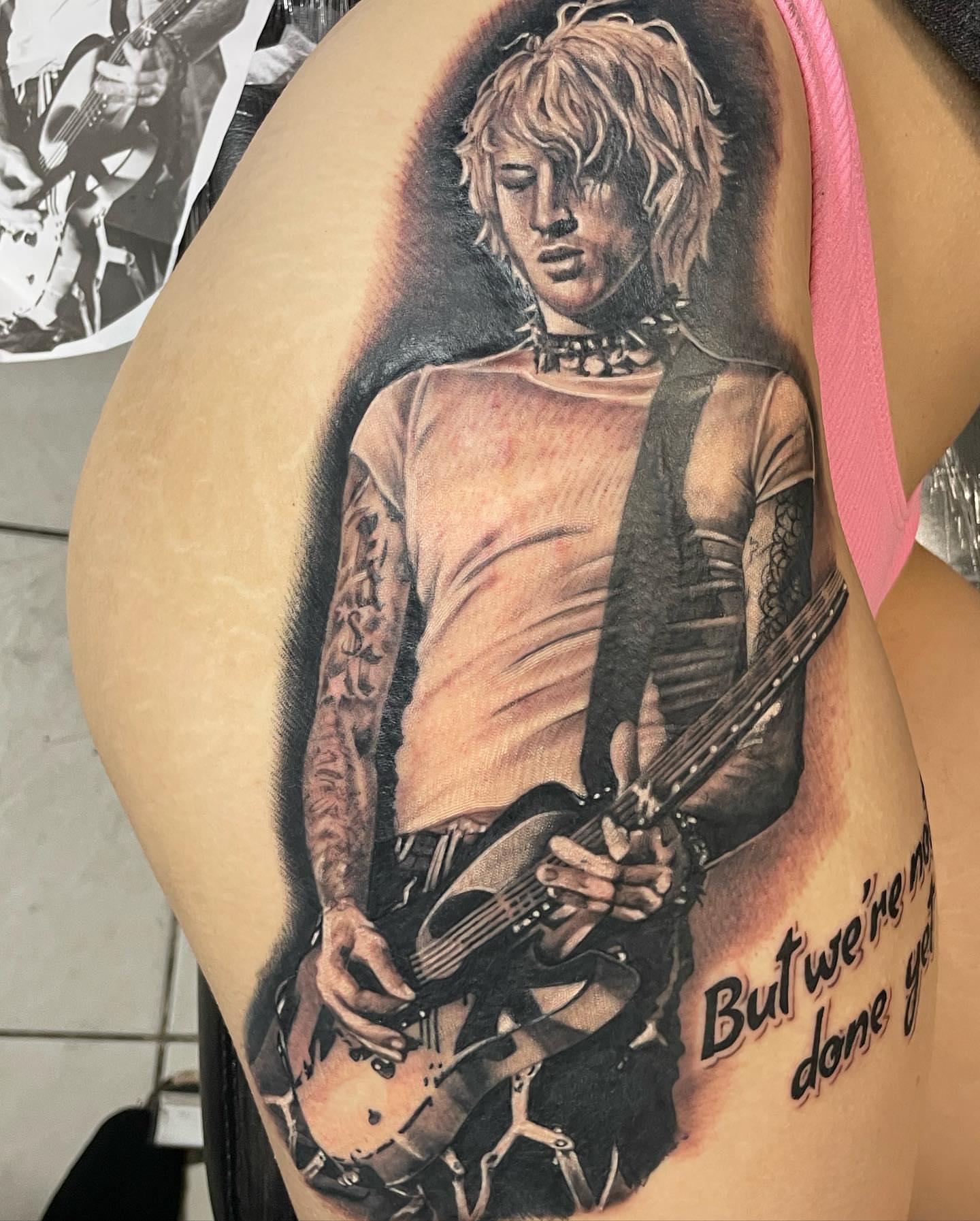 Guitarist realism tattoo on the thigh by payaso