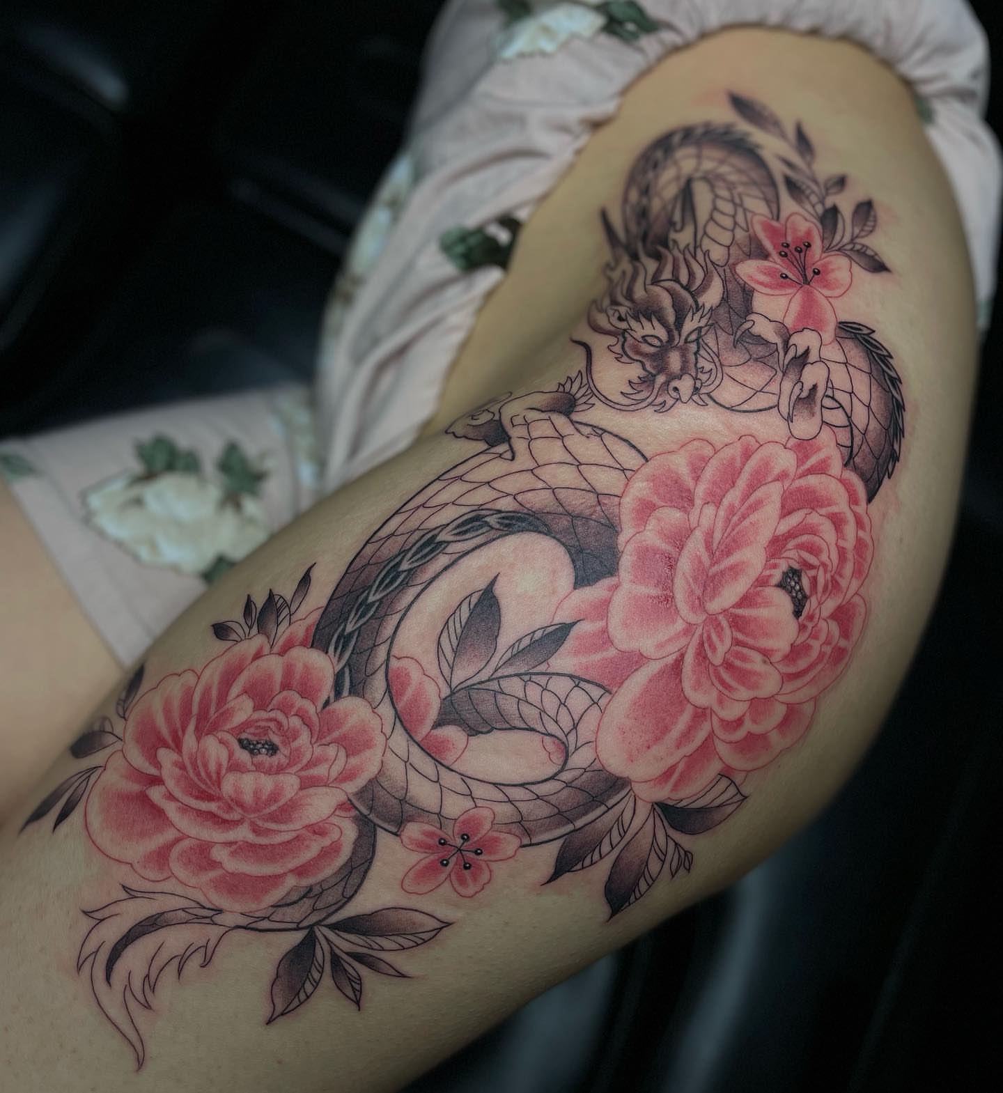 Snake and peony japanese irezumi tattoo on the thigh by Tam Nguyen