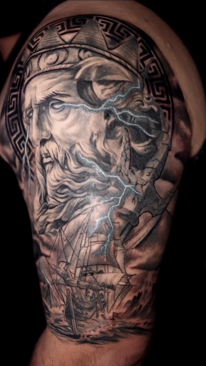 Zeus with lightning and ships realism tattoo by Binn Binn - Houston Tattoo Artist