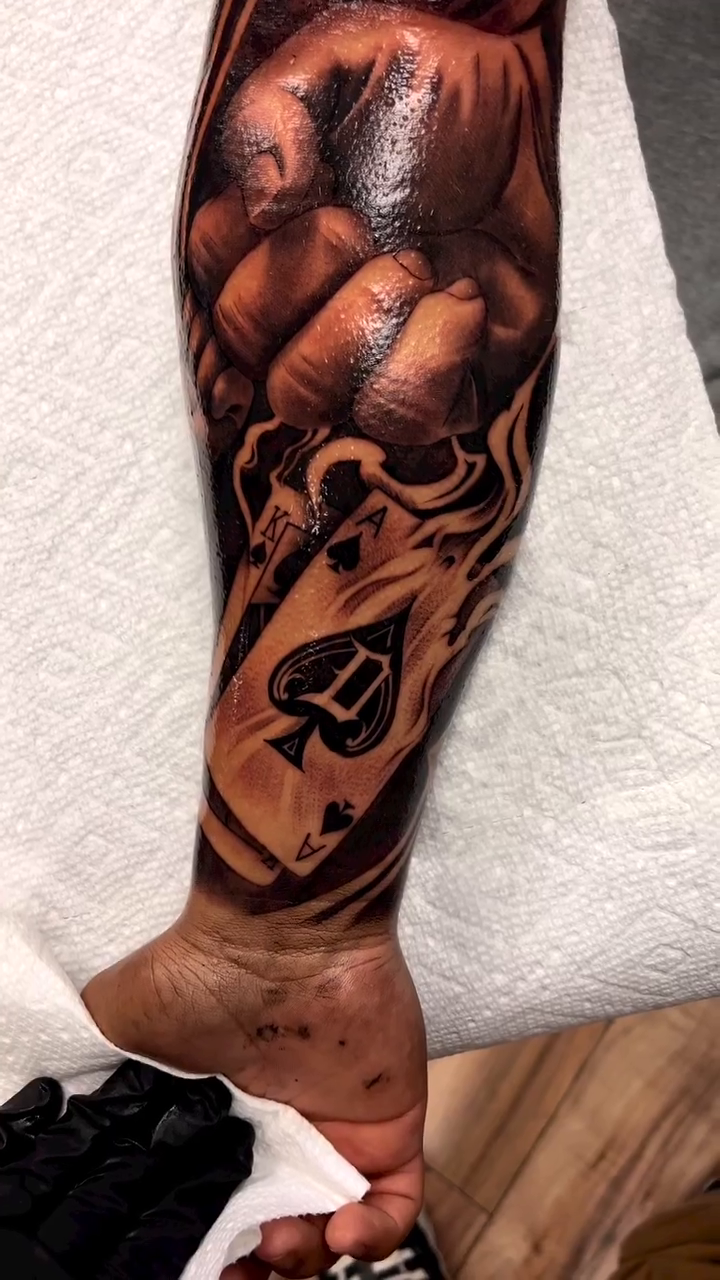 Fist and playing cards realism tattoo by ⚠️new Account⚠️