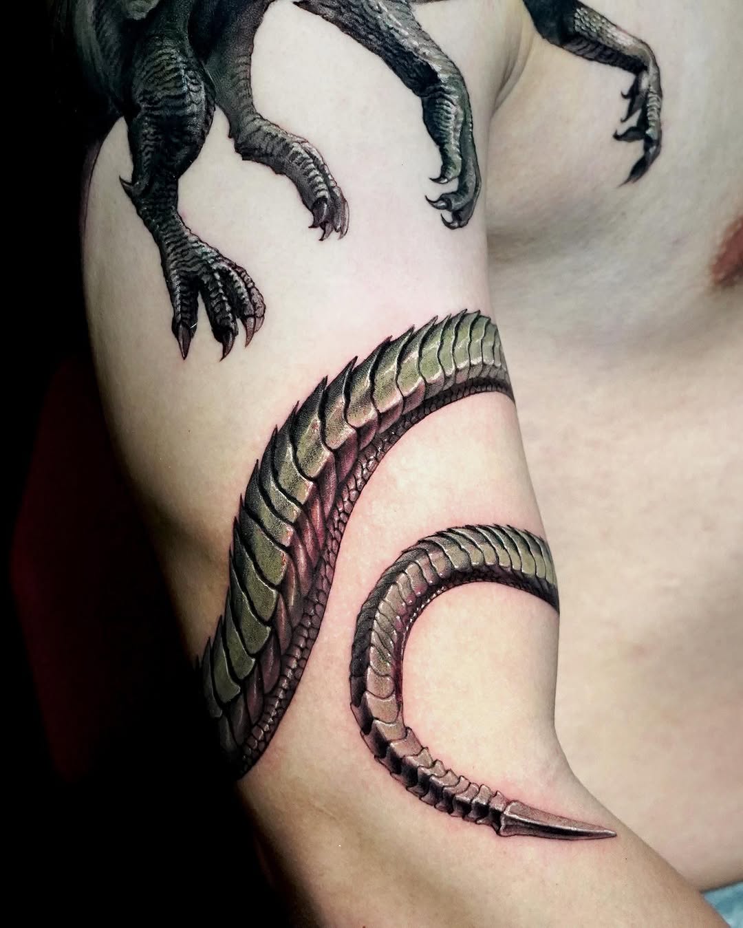 Dragon claws and tail realism tattoo on the thigh by Eun, Toronto, Ontario