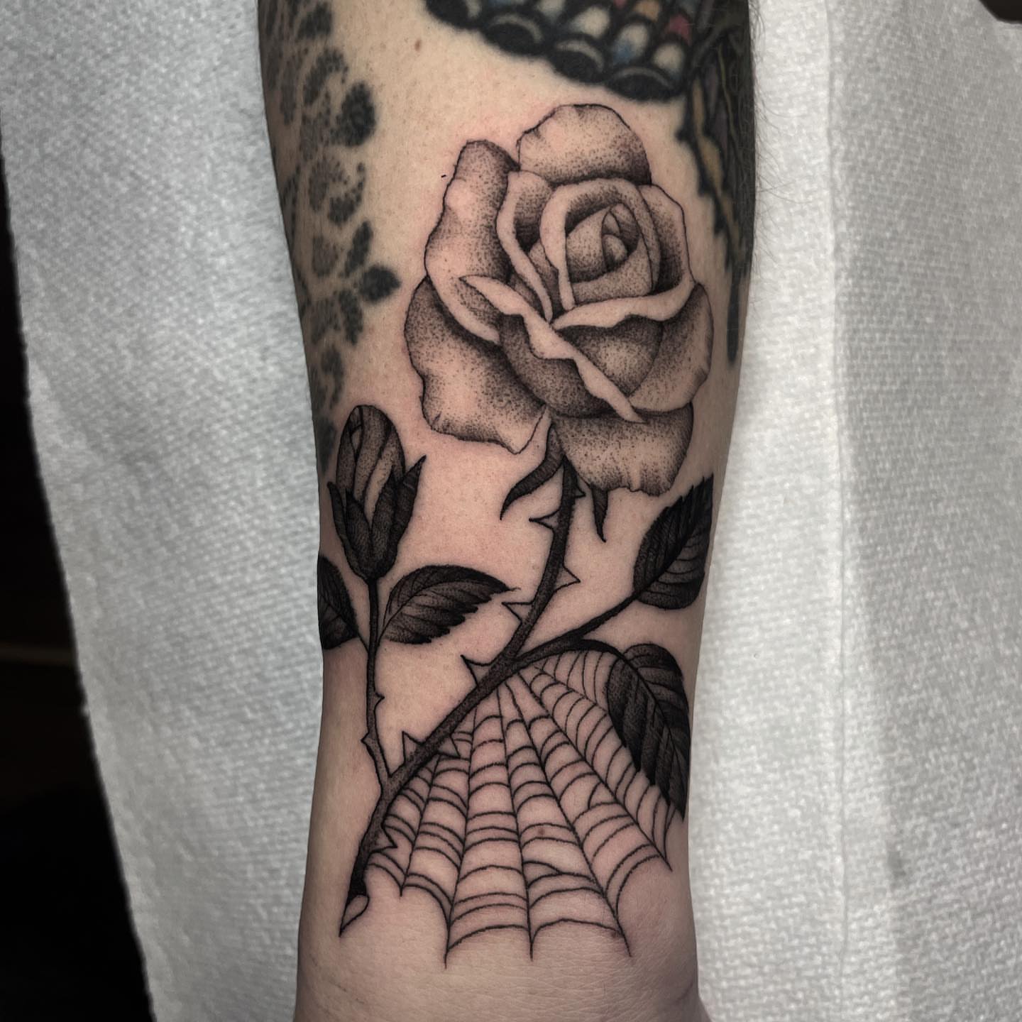 Rose and spiderweb dotwork tattoo on the forearm by derrick b. π² Modern Traditional Tattoo