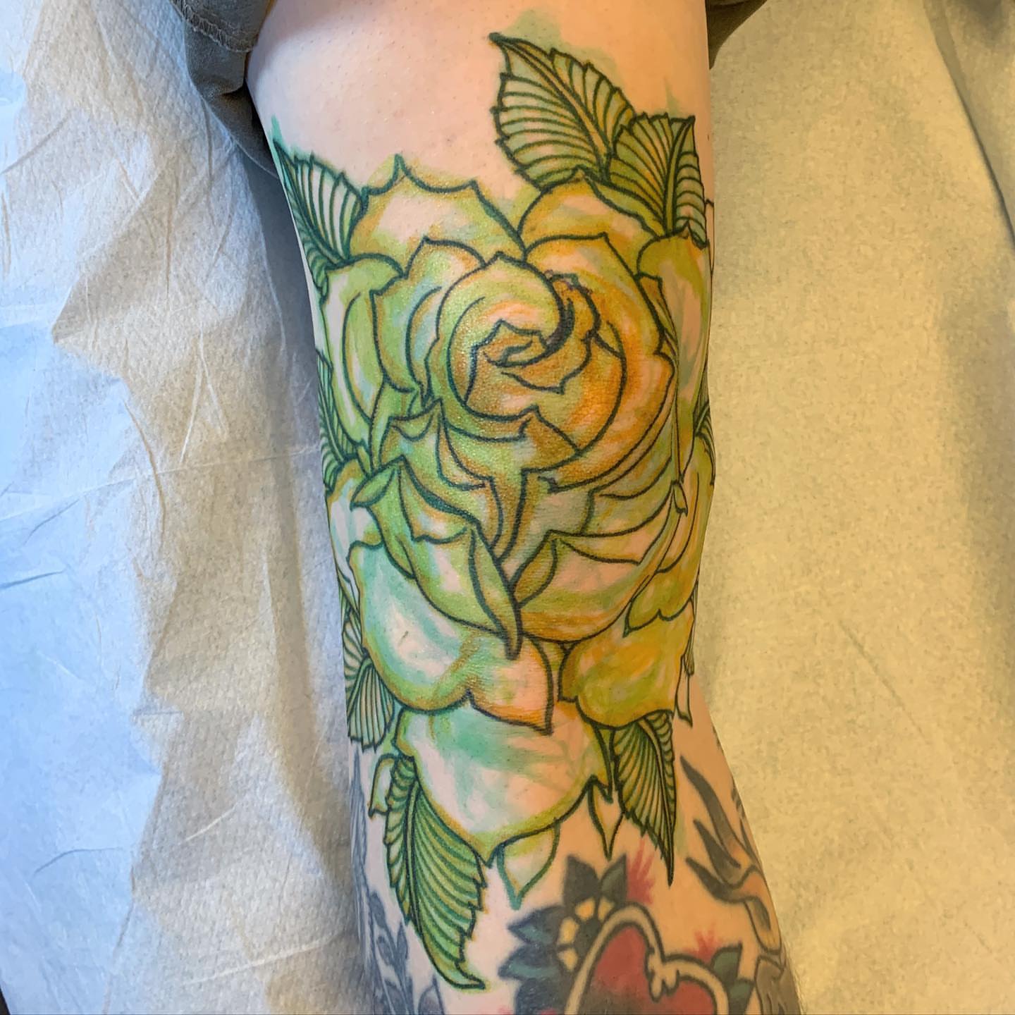 Rose American traditional tattoo on the forearm by Adam Mir
