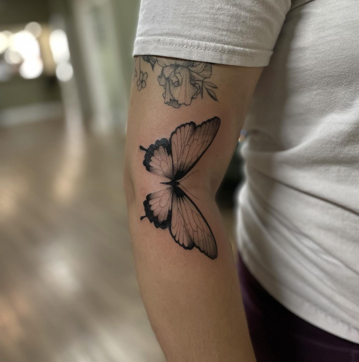 Butterfly black and grey tattoo on the forearm by 𝑅𝑒𝑒𝓈𝒶 𝐿𝓎𝓃𝓃 ₊ ⊹❀