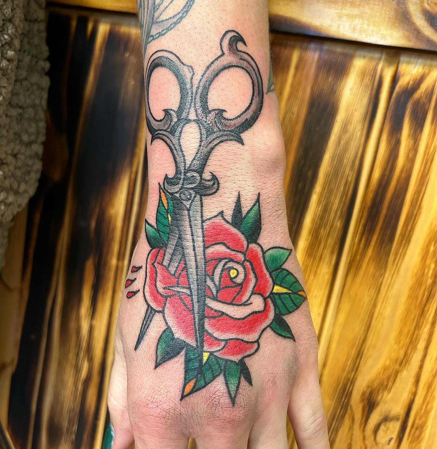 Scissors and rose American traditional tattoo on the hand by ππππππ ππππππ