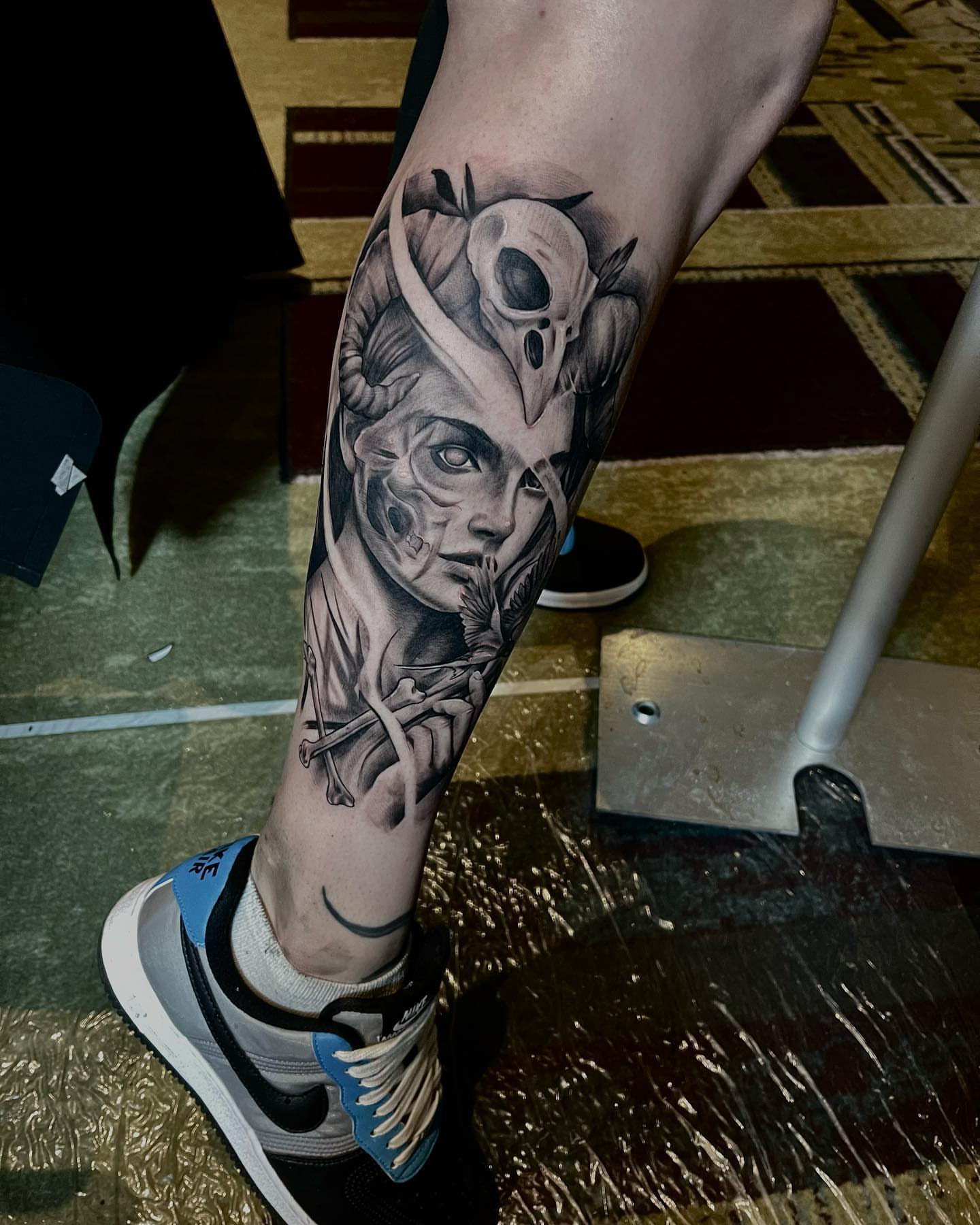 Woman with horns realism tattoo on the forearm by Aaron Watson