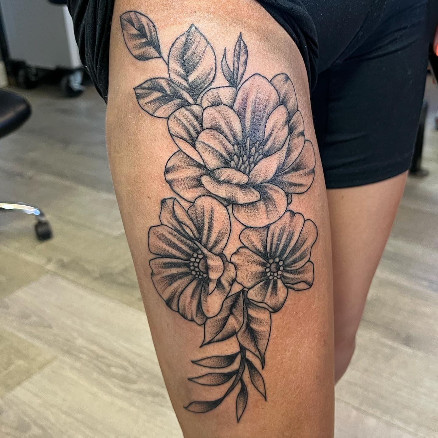 Flowers dotwork tattoo on the thigh by Breanna💉🔮, Dover, Delaware