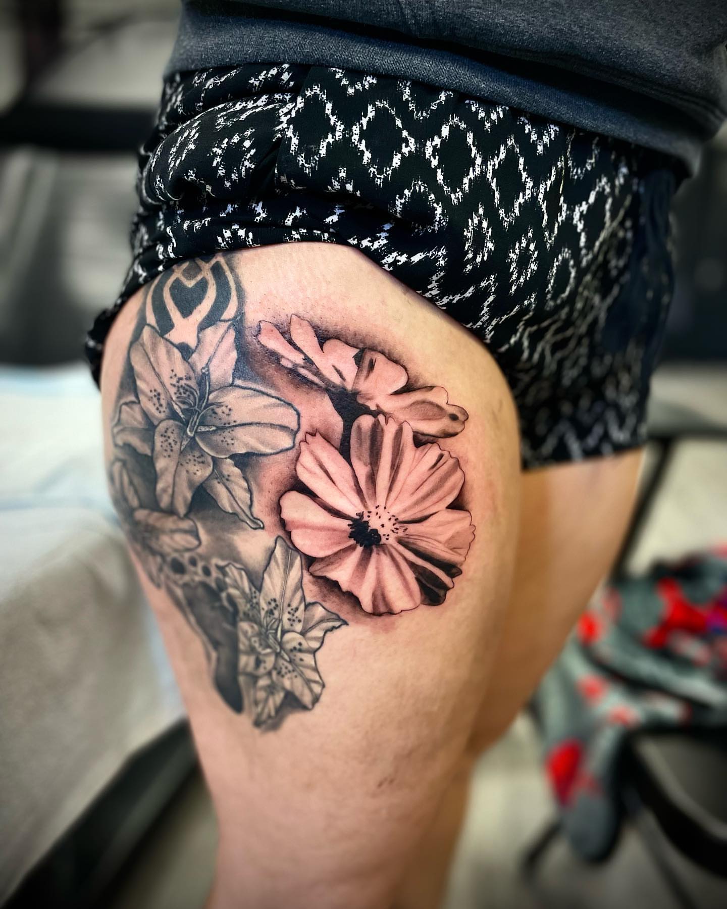 Flowers realism tattoo on the thigh by Immortal BAYAREA TATTOO ARTIST
