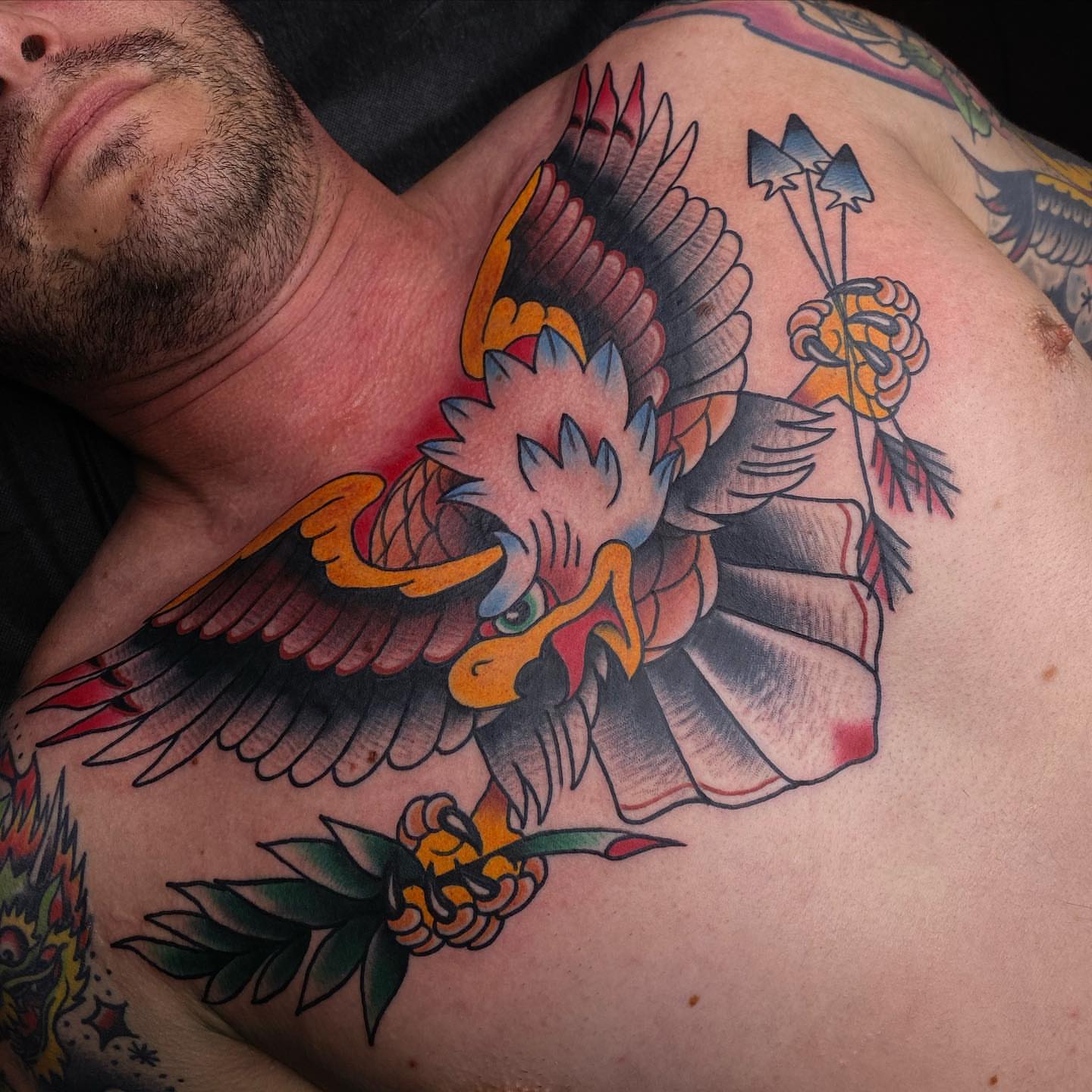 Eagle American traditional tattoo on the shoulder by George Weibe