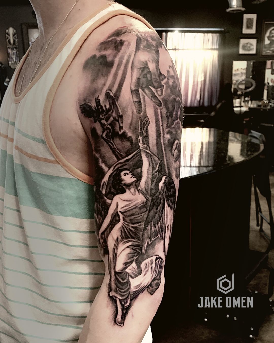 Tattoo by @jakeomen — black_and_grey, realism