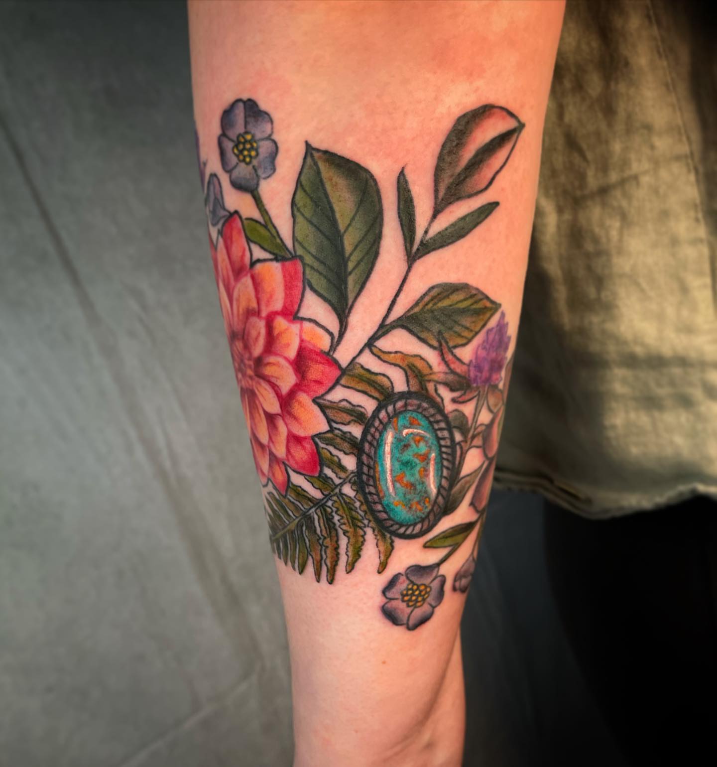 Floral arrangement realism tattoo on the forearm by 𝓚𝓪𝓼𝓼𝓪𝓷𝓭𝓻𝓪 𝓜𝓬𝓒𝓪𝓵𝓵, Eugene, Oregon