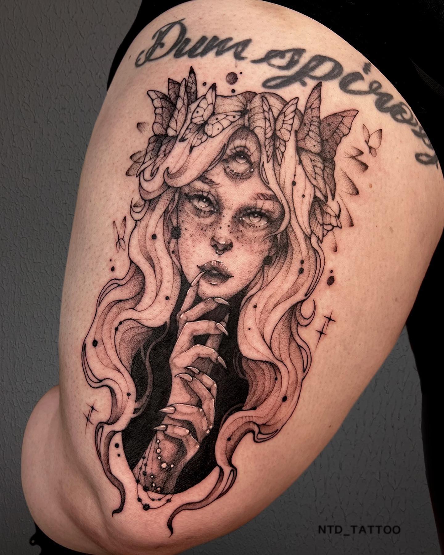 Woman with butterflies dotwork tattoo on the thigh by Tetiana Maxon