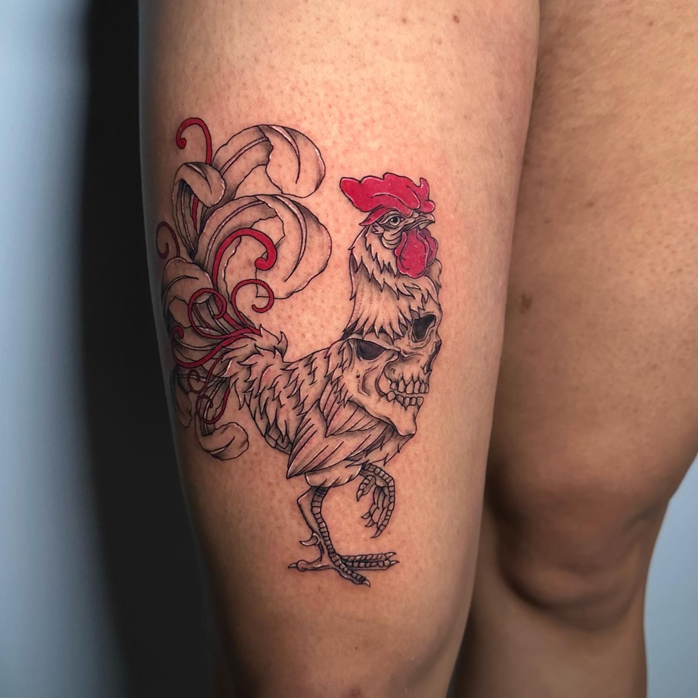 Rooster neo-traditional tattoo on the thigh by Megan McKee Tattoo Artist