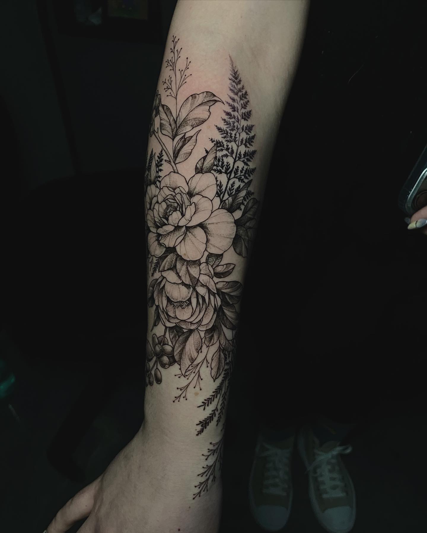 Floral bouquet realism tattoo on the forearm by Sydney Dixon, Sacramento, California