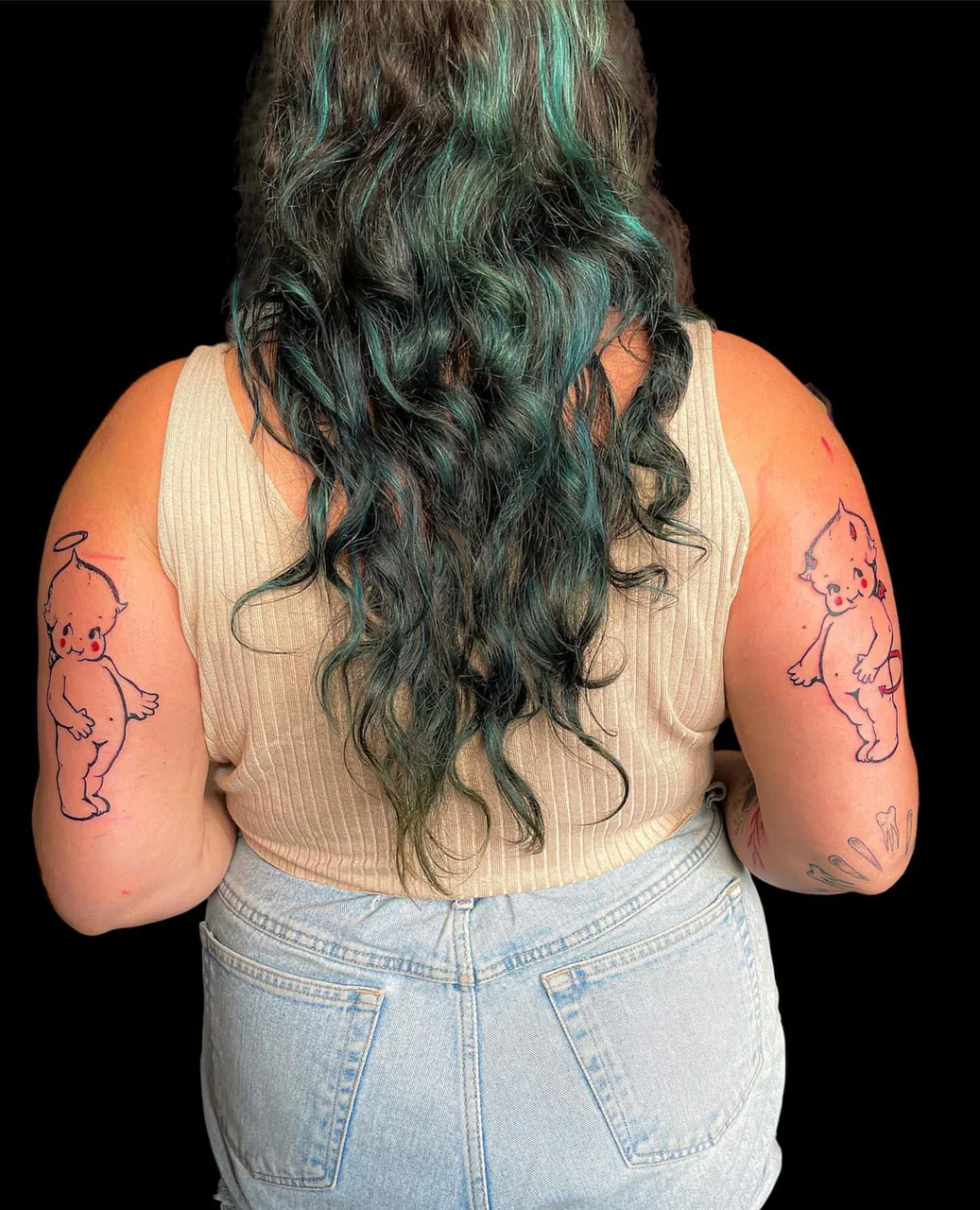 Angelic baby American traditional tattoo on the upper arm by lizzy, Damascus, Maryland