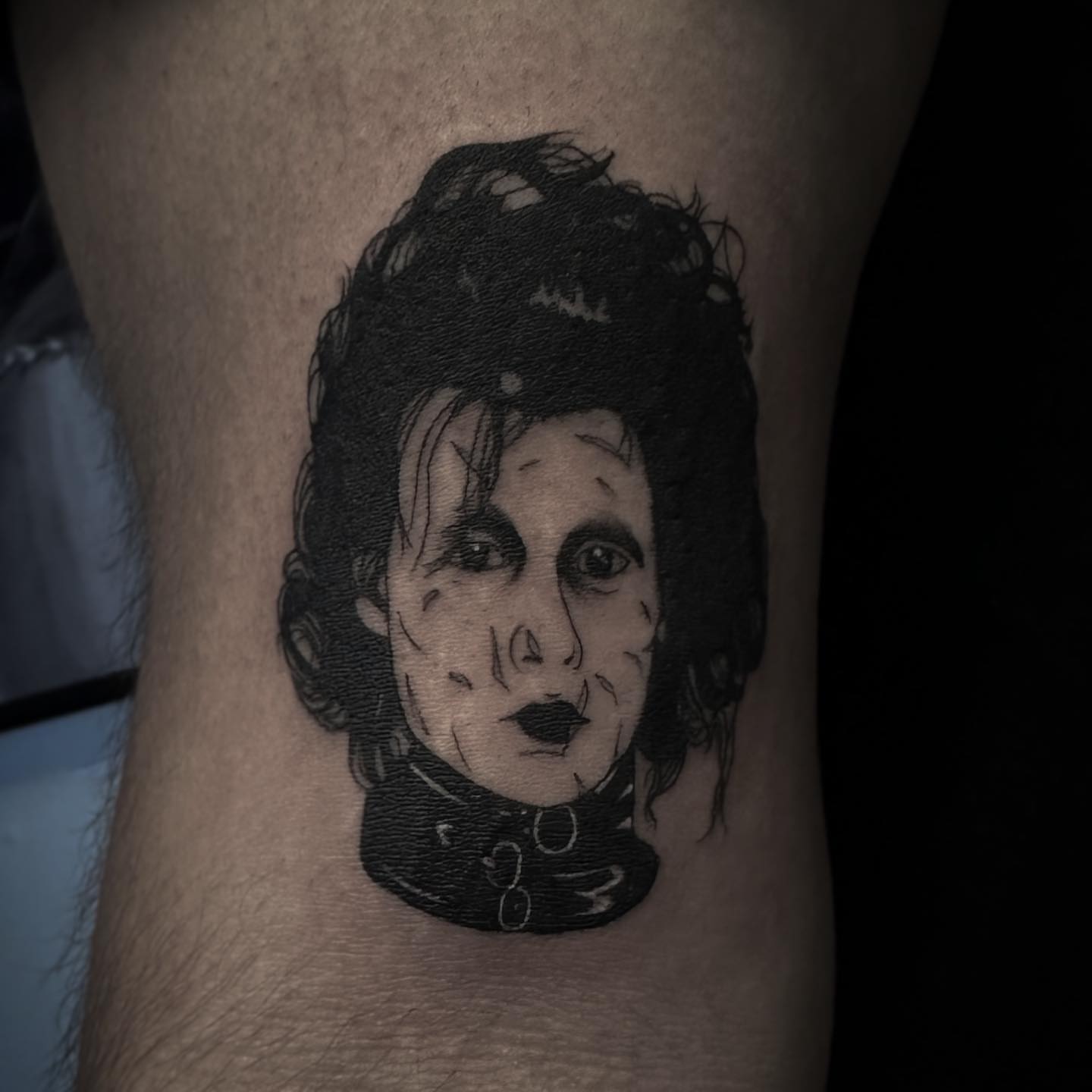 Portrait black and grey tattoo on the forearm by Rachel Martinez
