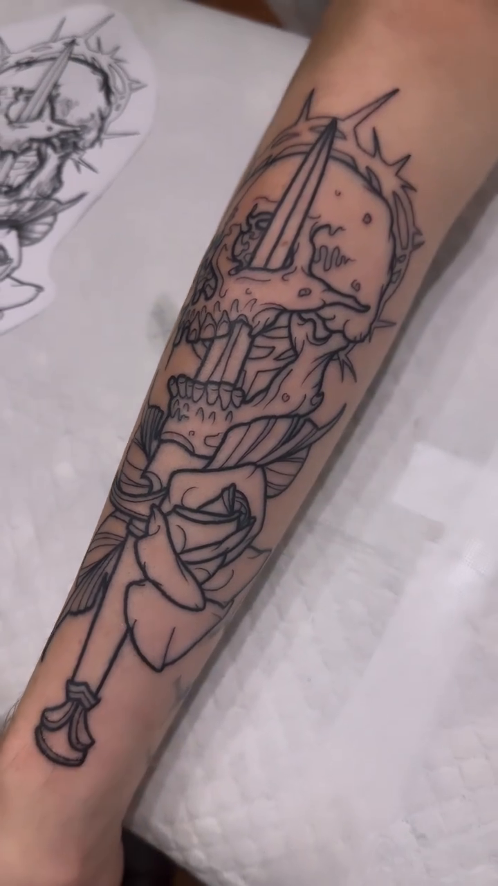 Skull with sword and roses realism tattoo by gillian marie