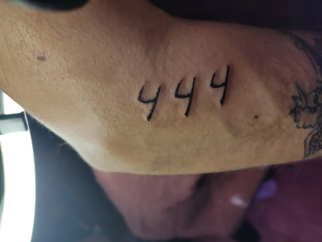 Numbers 444 tattoo on the forearm by Tatuadora & Piercer
