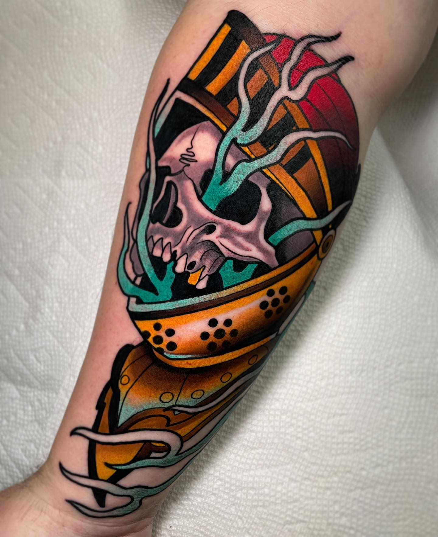 Skull American traditional tattoo on the forearm by Cory Cartwright