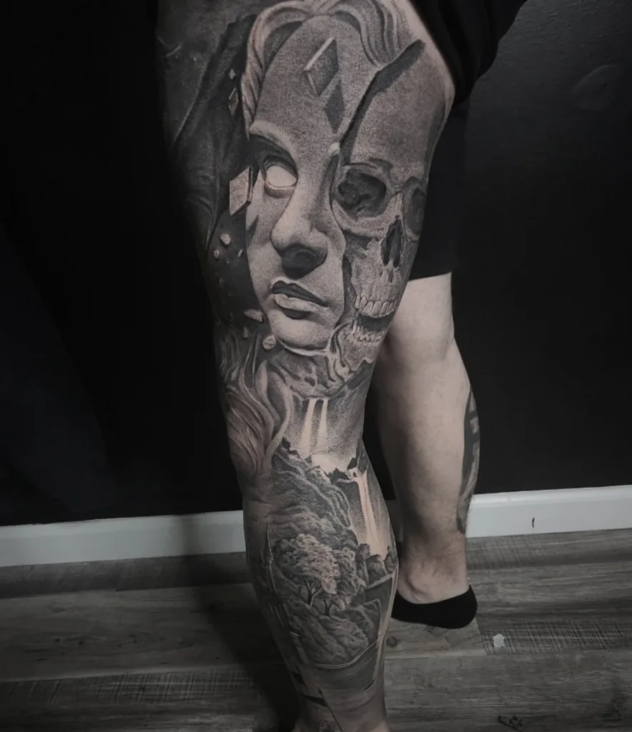 Mask and skull dotwork tattoo on the leg by Kyle Joseph [tattoo artist]