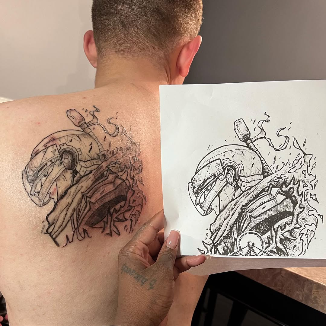Robot head with flames tattoo on the back by Lea-yae’