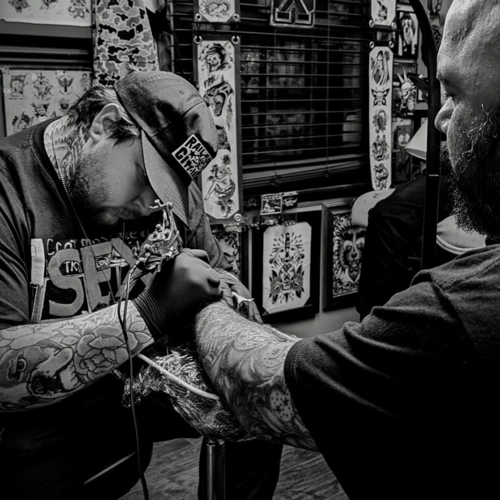 Tattoo artist American traditional tattoo on the upper arm by Troy Mort, Altoona, Pennsylvania