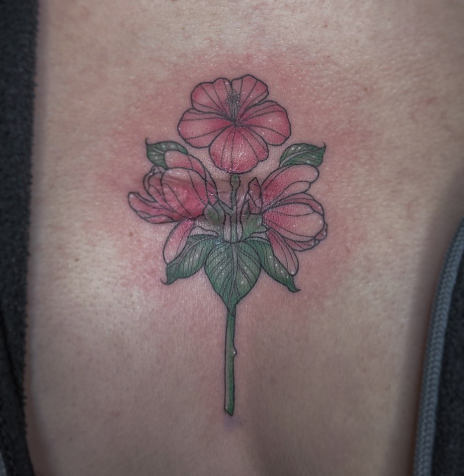 Flower bouquet realism tattoo on the chest by Rachel Martinez