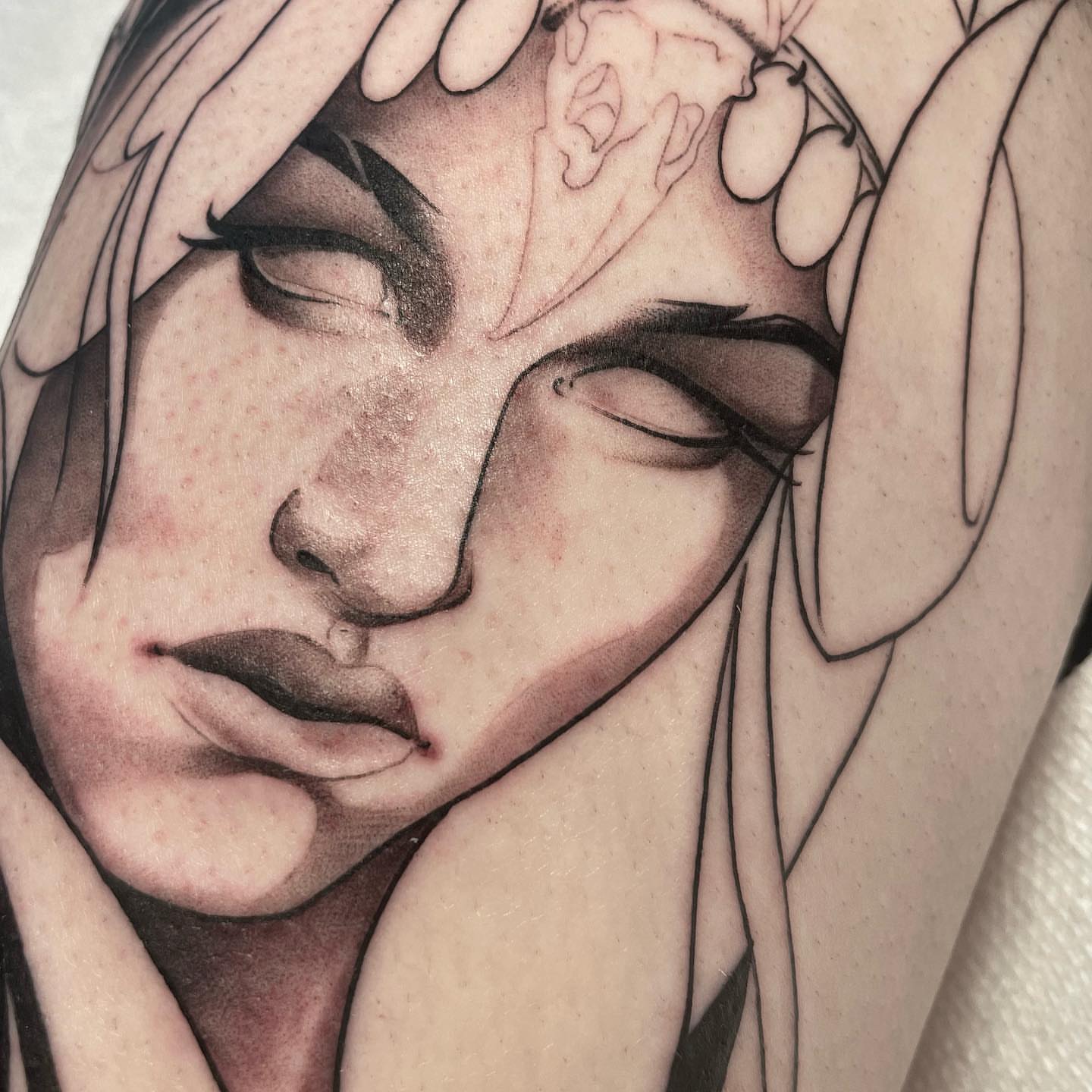 Woman's face realism tattoo on the shoulder by Angel, Salt Lake City, Utah