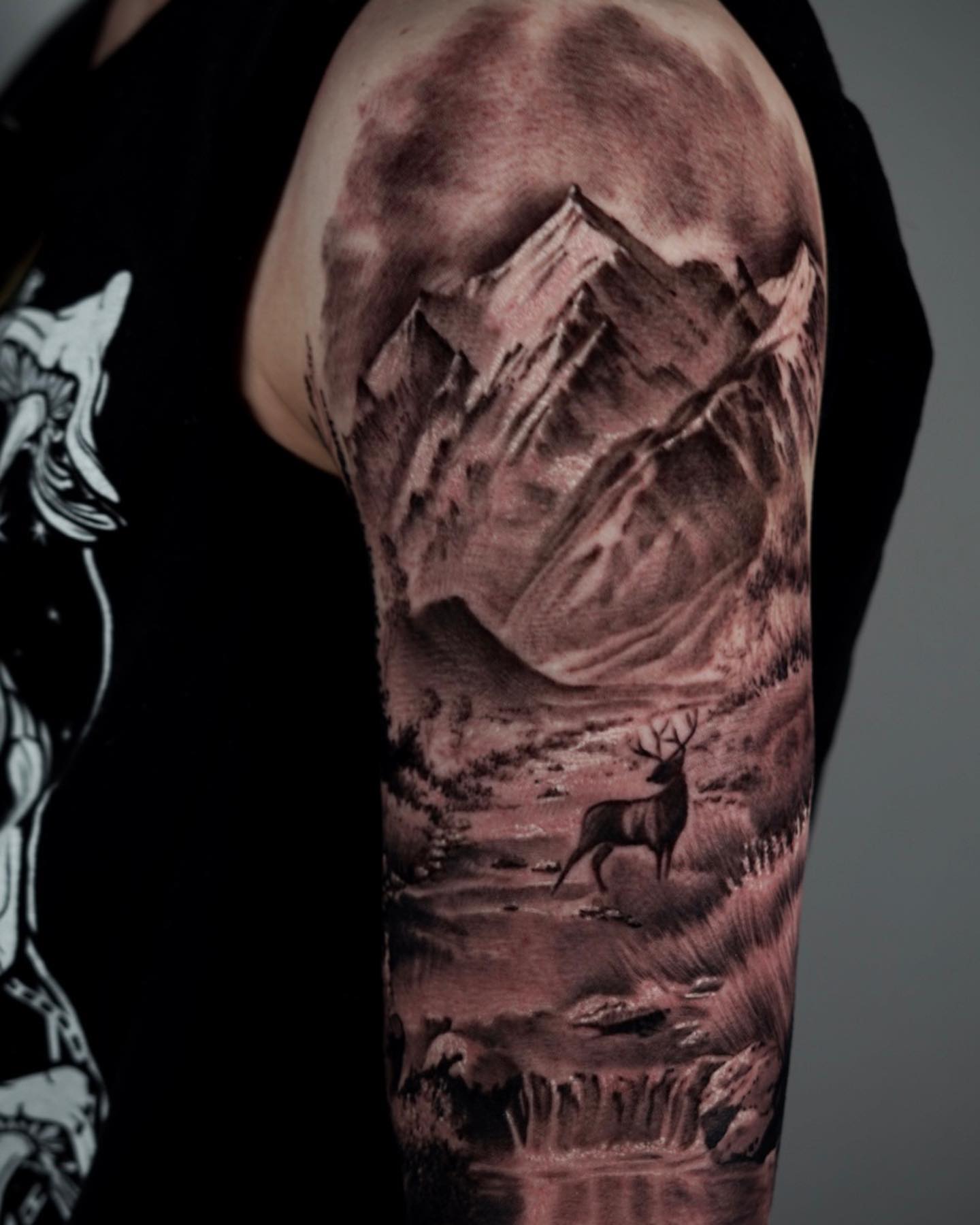 Mountain landscape realism tattoo on the forearm by DREW ROMERO - Colorado Tattoo Artist, Pueblo, Colorado