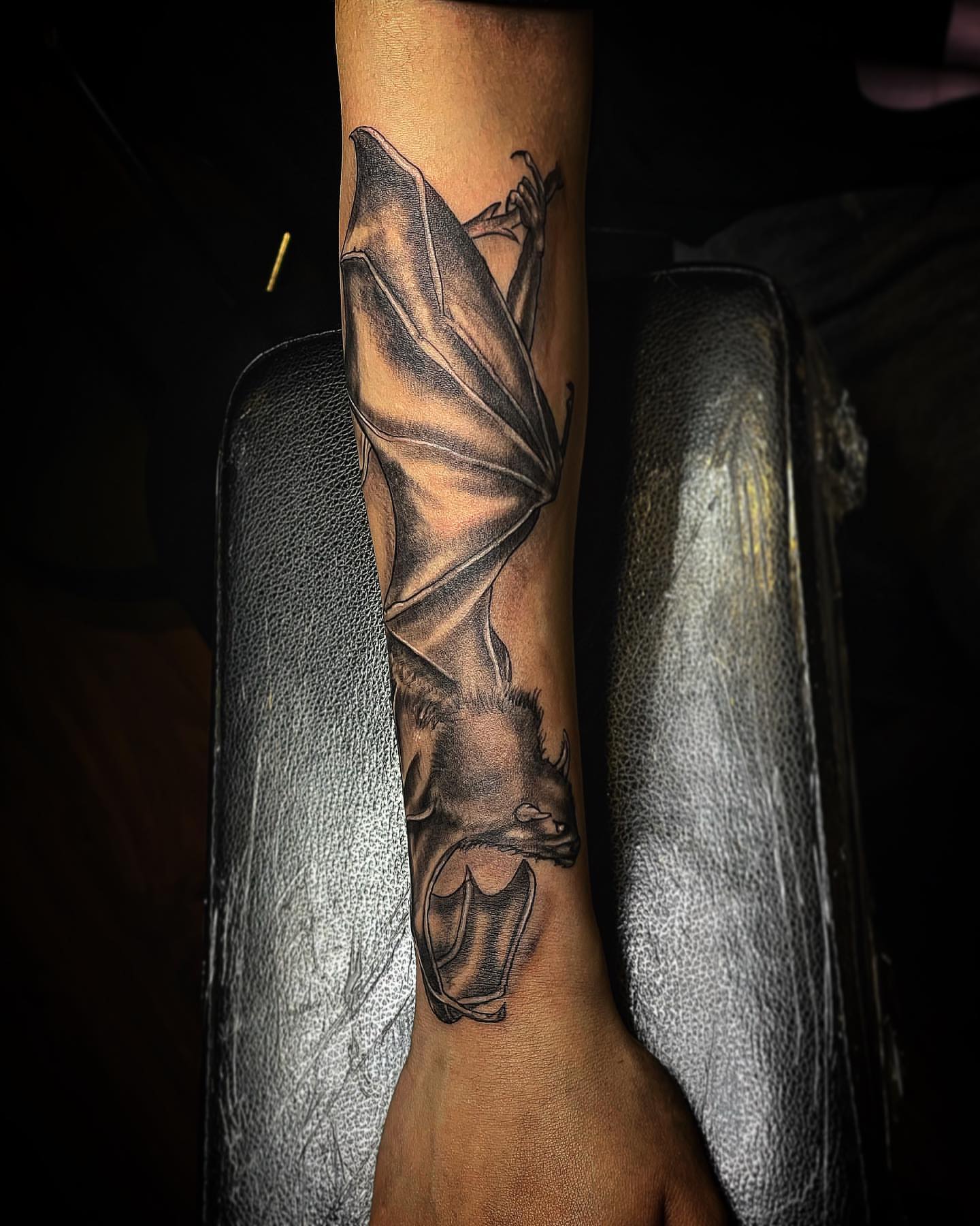 Bat realism tattoo on the forearm by David Mariscal